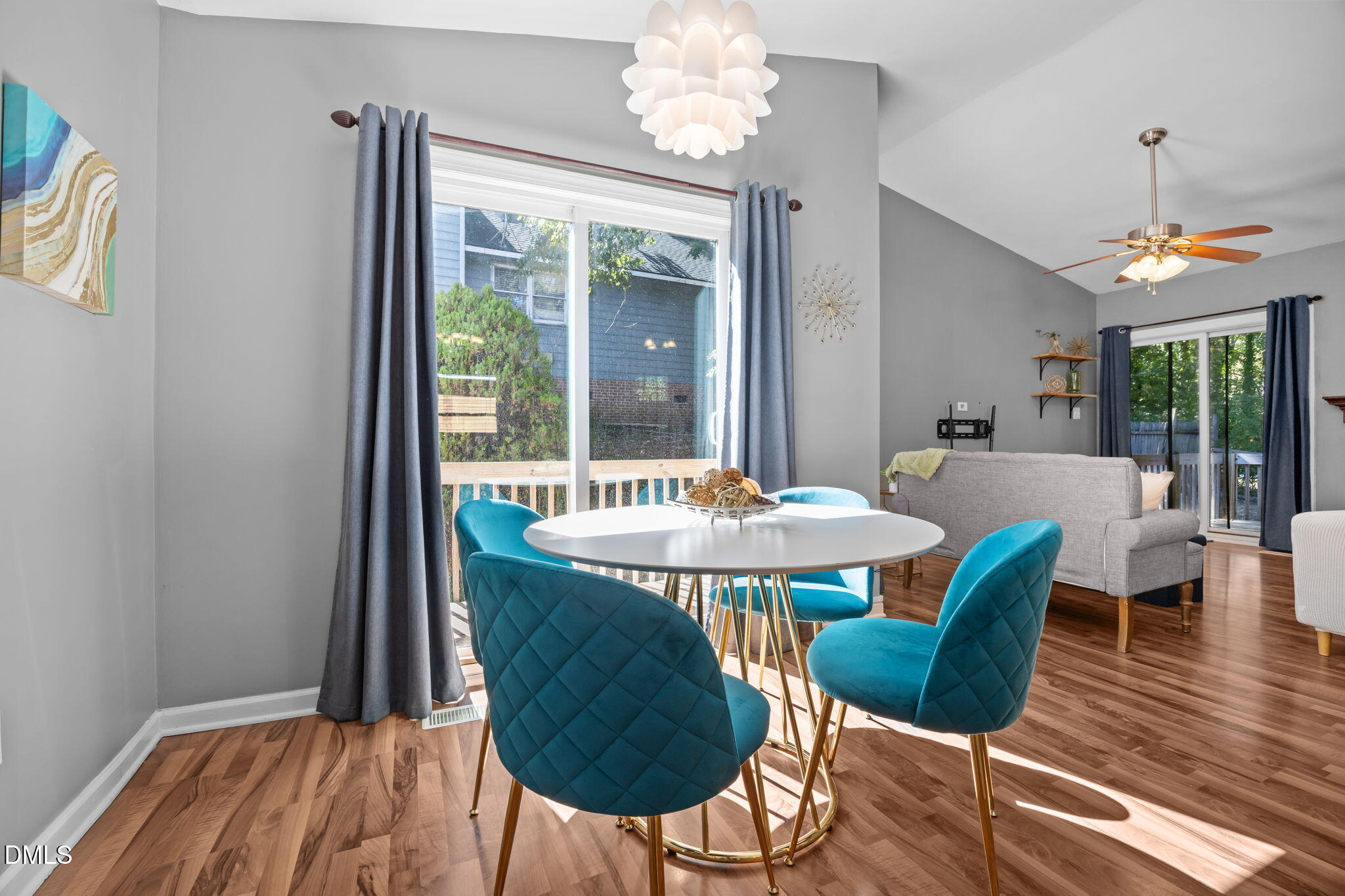 440 Dickens Drive Raleigh, NC 27610 - Photo 2 of 18 a view of a dining room with furniture window and wooden floor