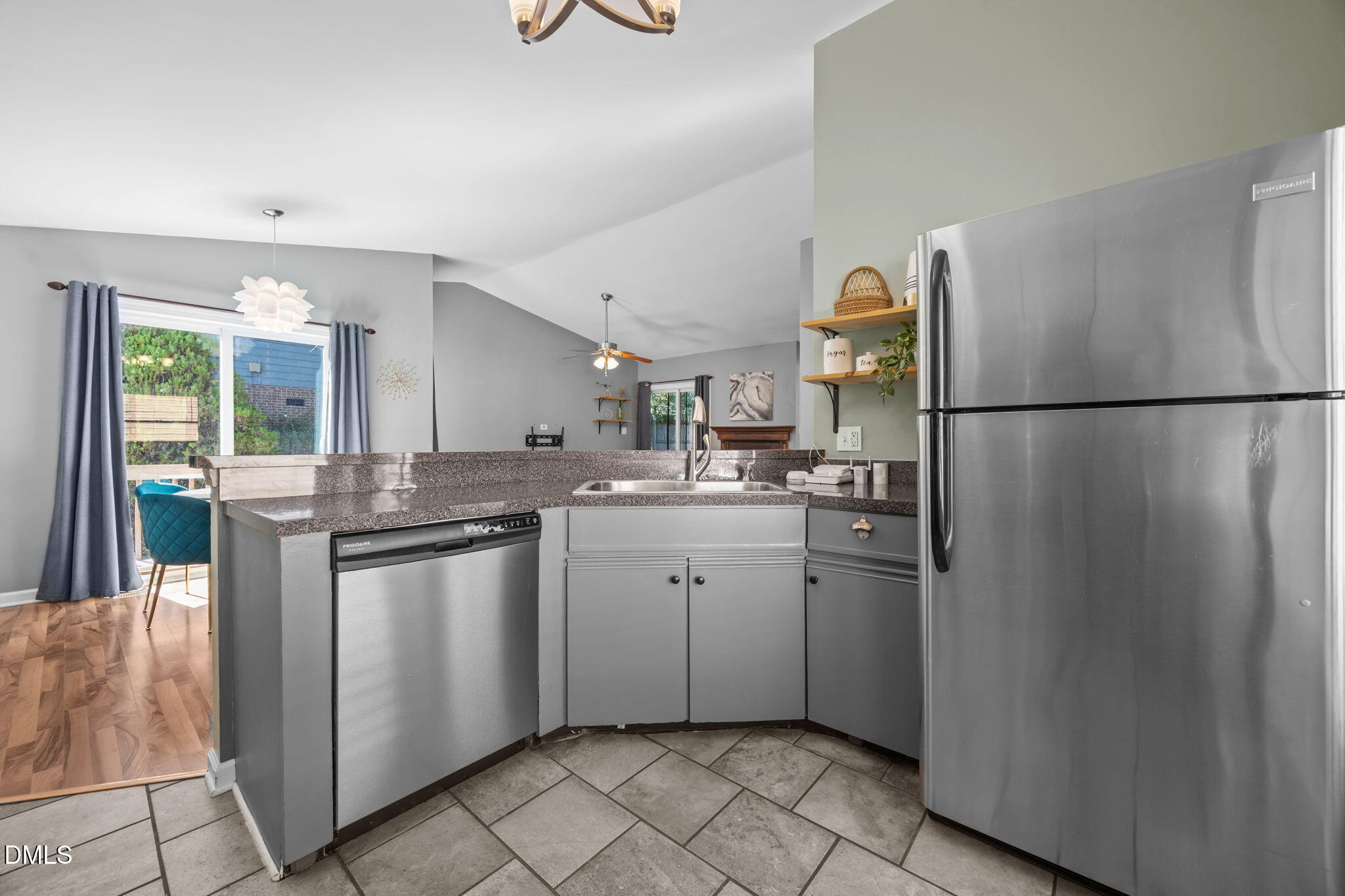 440 Dickens Drive Raleigh, NC 27610 - Photo 4 of 18 a kitchen with a white cabinets and refrigerator