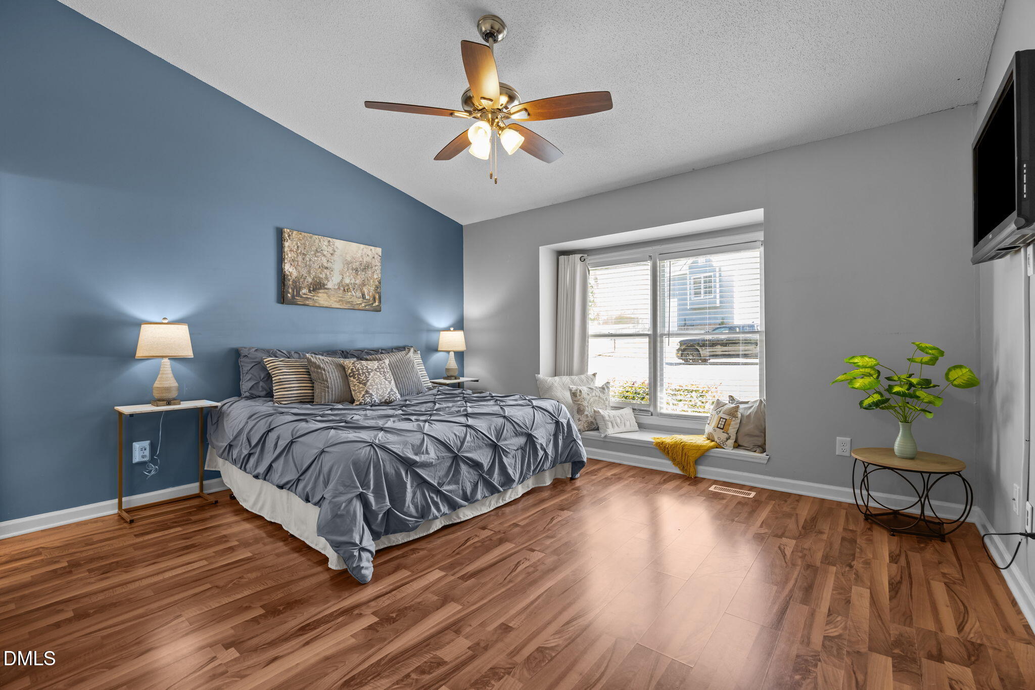 440 Dickens Drive Raleigh, NC 27610 - Photo 6 of 18 a living room with a bed furniture and a large window