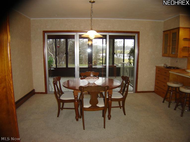 6612 South Ridge Road East Kingsville, OH 44048 - Photo 3 of 24 Formal dining rm. goes out to the sunrm.