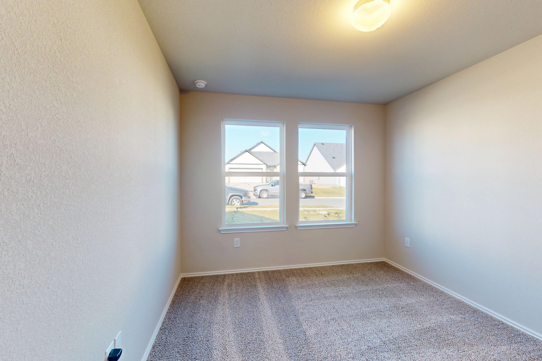 11917 Dillon Fls Drive Austin, TX 78747 - Photo 17 of 38 an empty room with a window