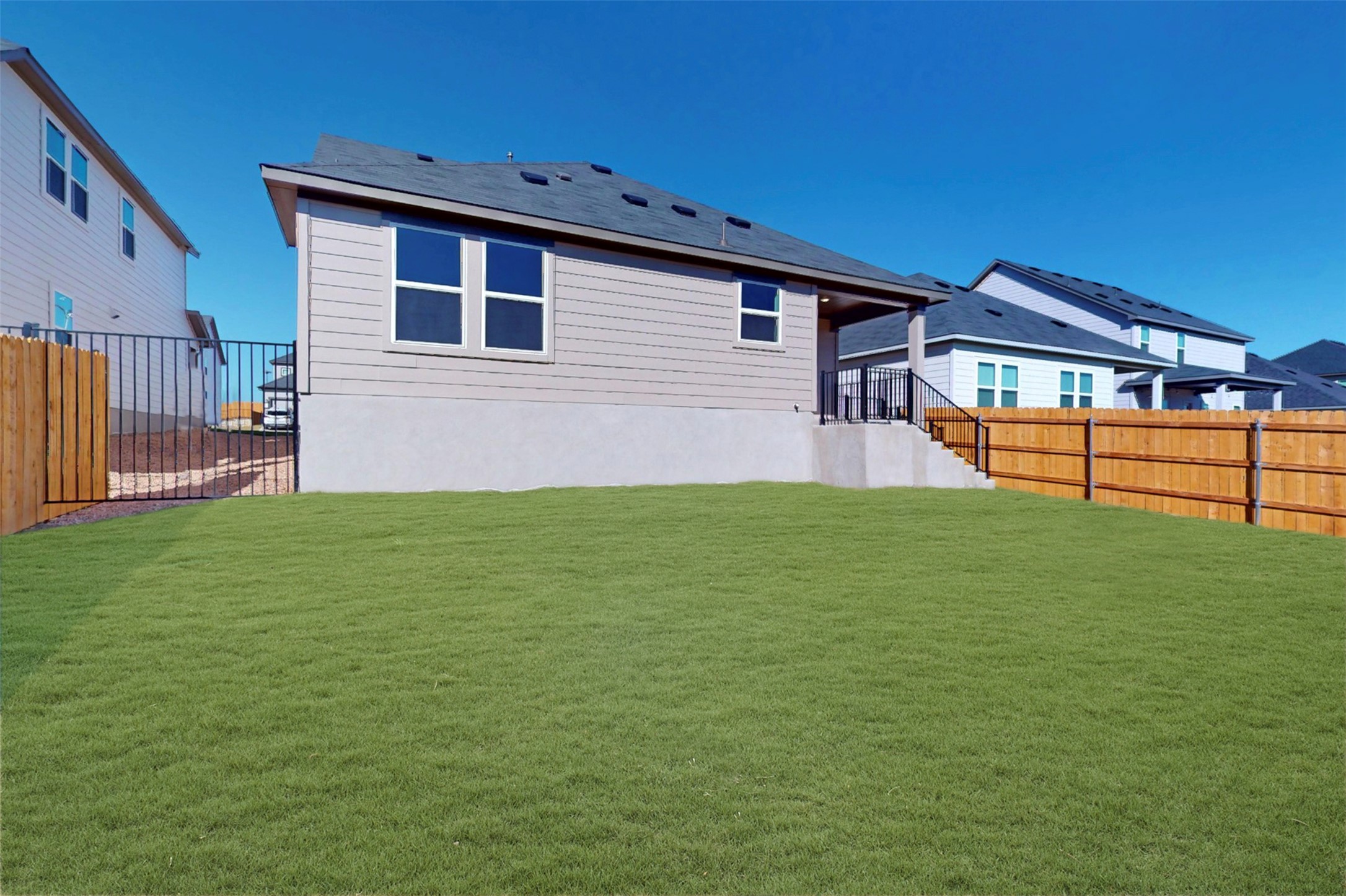11917 Dillon Fls Drive Austin, TX 78747 - Photo 27 of 38 a front view of house with yard