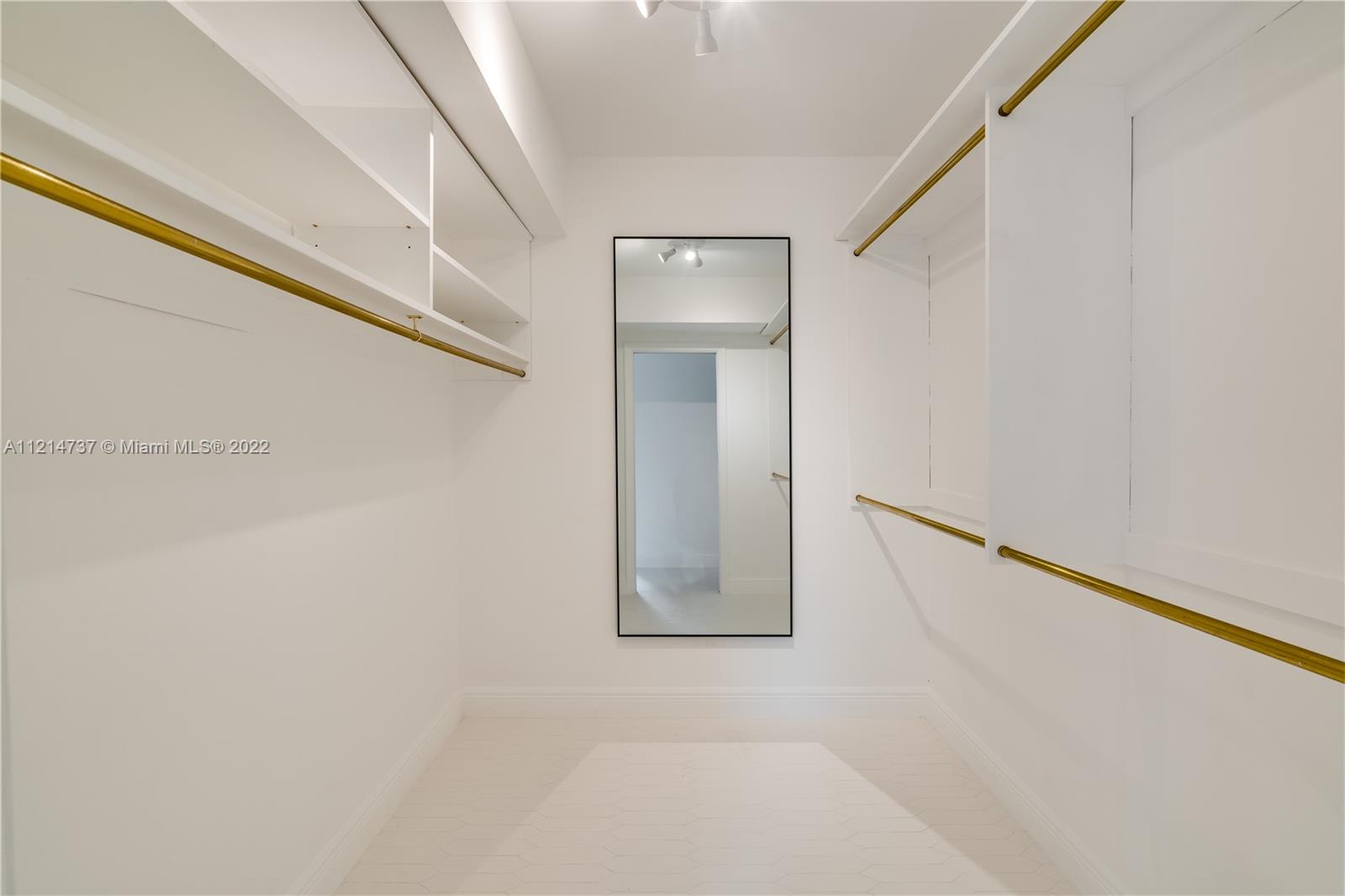 3731 Battersea Road Miami, FL 33133 - Photo 20 of 44 a view of staircase with white walls