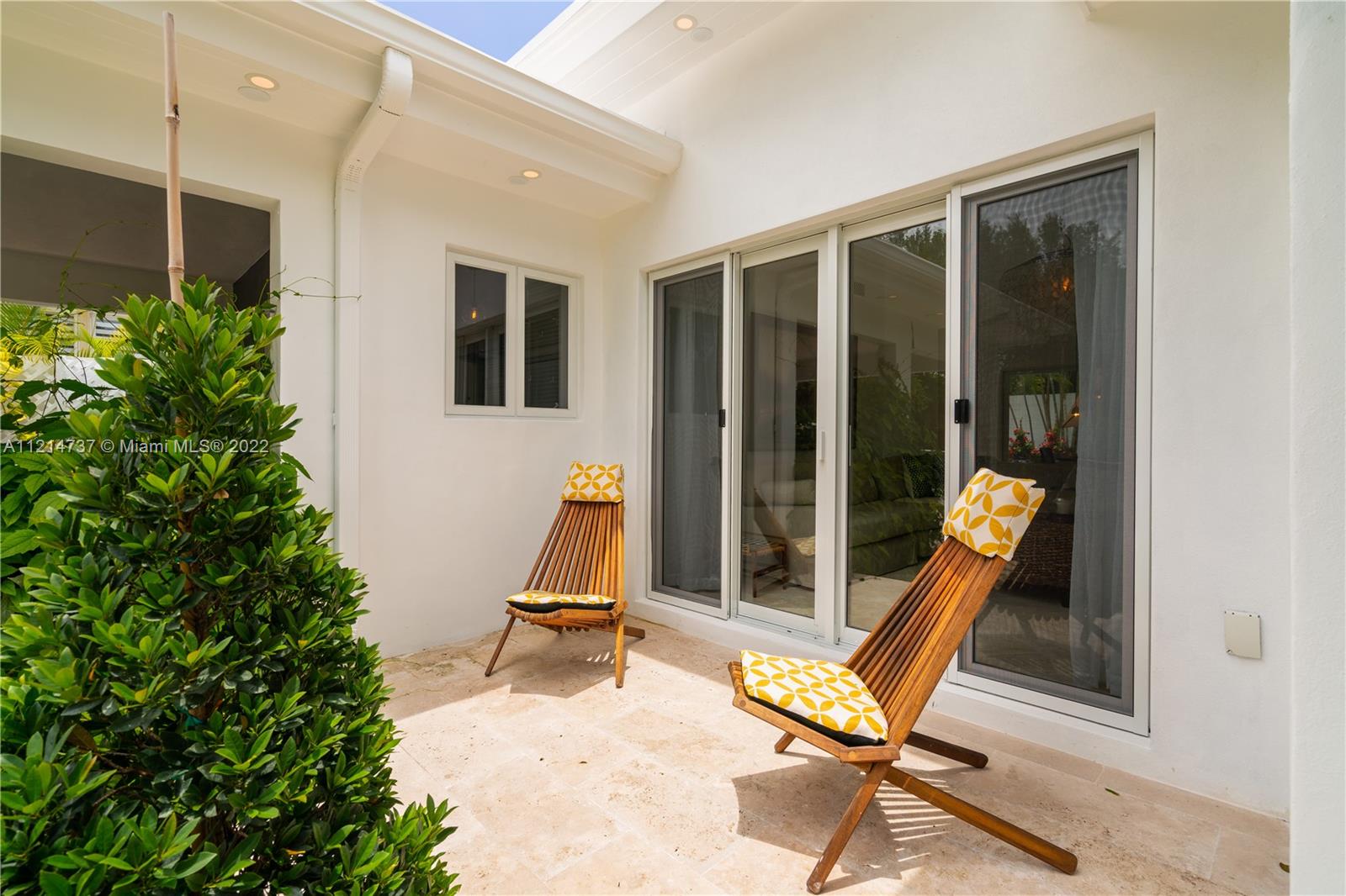 3731 Battersea Road Miami, FL 33133 - Photo 37 of 44 a view of swimming pool with seating area