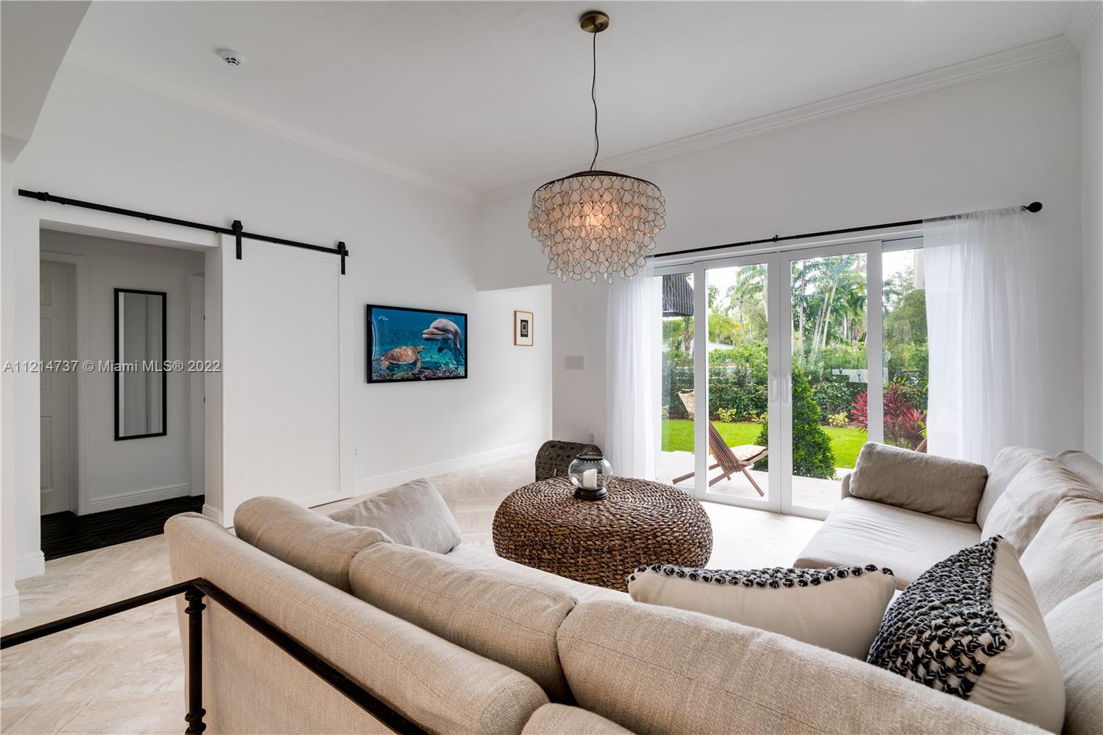 3731 Battersea Road Miami, FL 33133 - Photo 44 of 44 a living room with furniture and a window