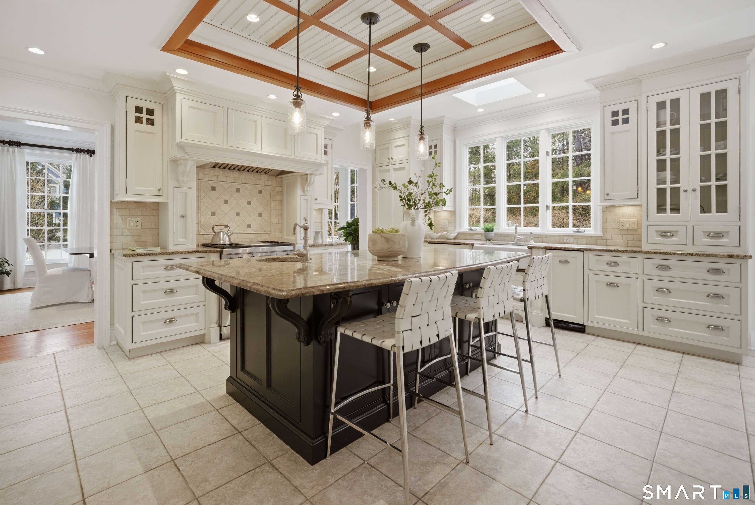 677 Eleven O'Clock Road Fairfield, CT 06824 - Photo 11 of 36 a kitchen with stainless steel appliances a sink and cabinets