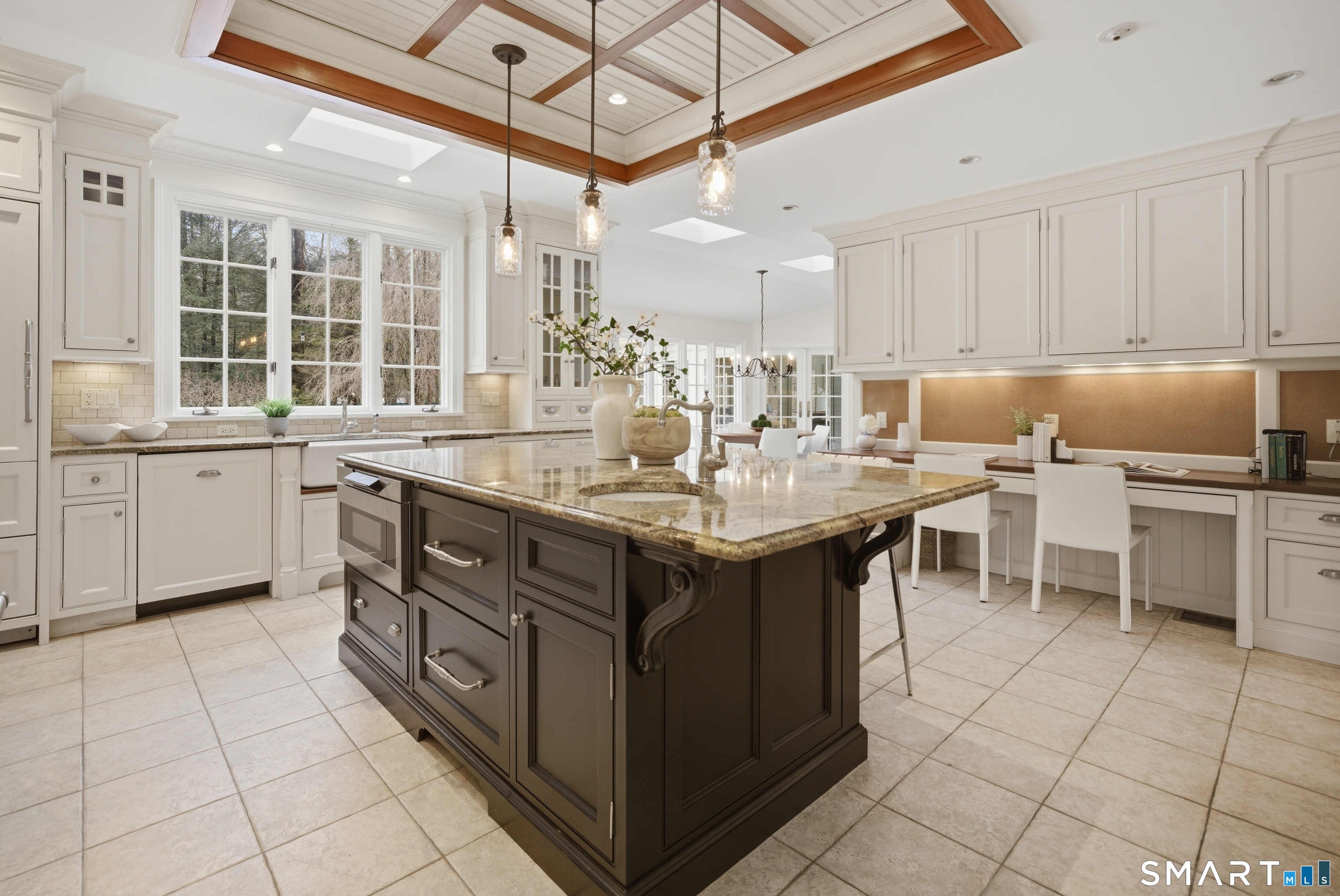 677 Eleven O'Clock Road Fairfield, CT 06824 - Photo 12 of 36 a kitchen with a sink and cabinets