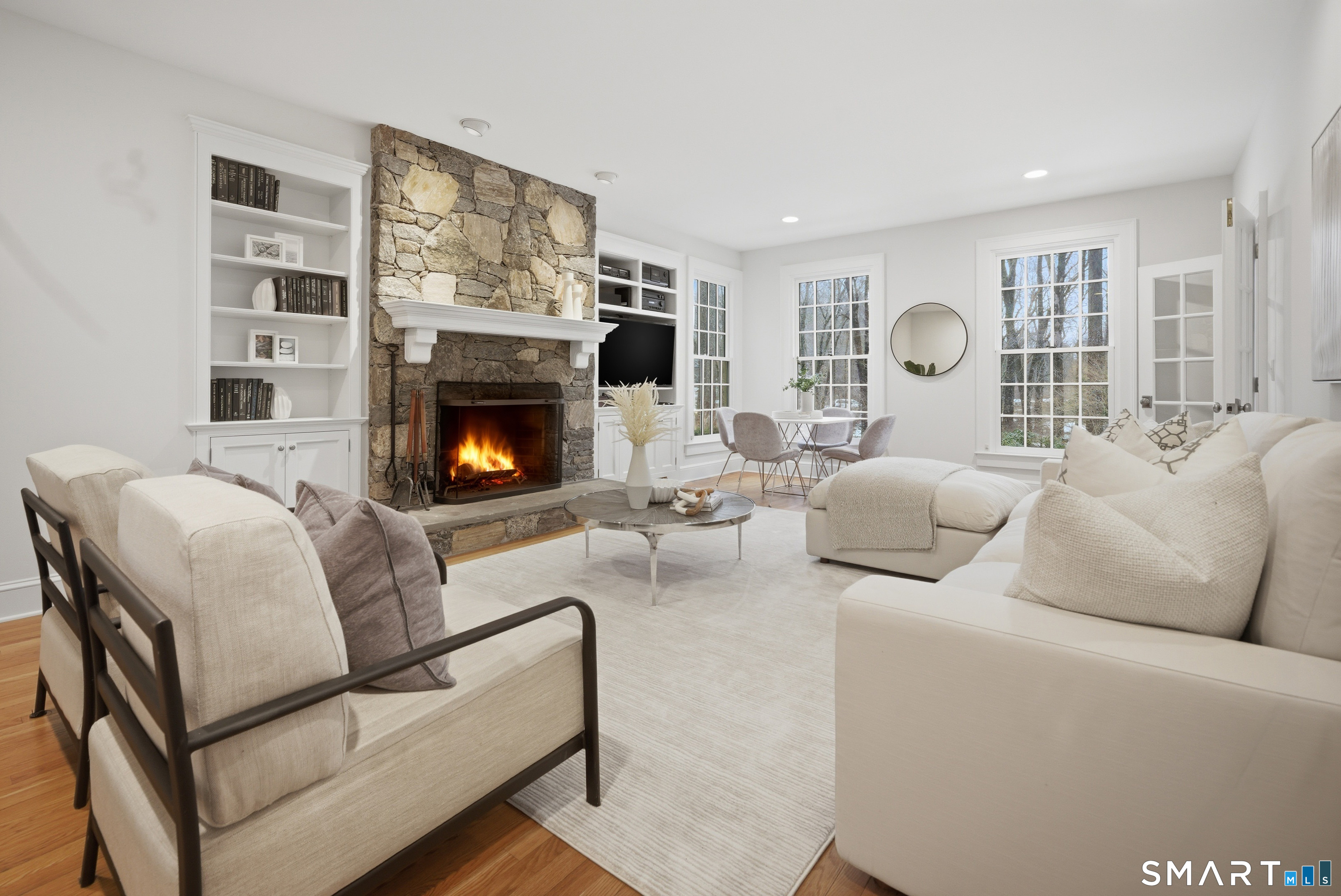 677 Eleven O'Clock Road Fairfield, CT 06824 - Photo 14 of 36 a living room with furniture fireplace and window
