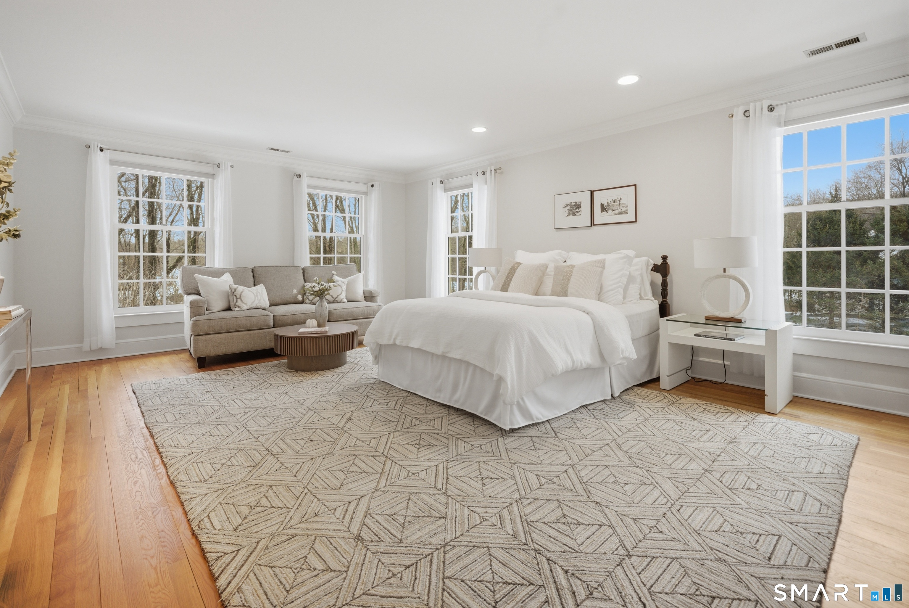 677 Eleven O'Clock Road Fairfield, CT 06824 - Photo 18 of 36 a spacious bedroom with a bed and glass window