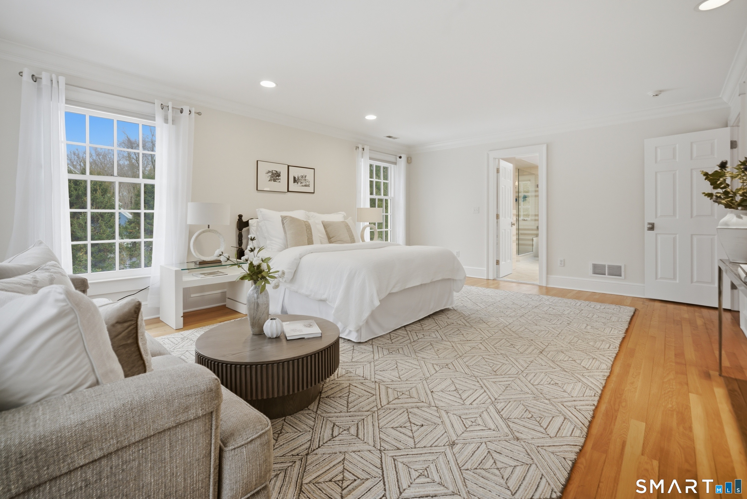 677 Eleven O'Clock Road Fairfield, CT 06824 - Photo 19 of 36 a living room with furniture and a large window