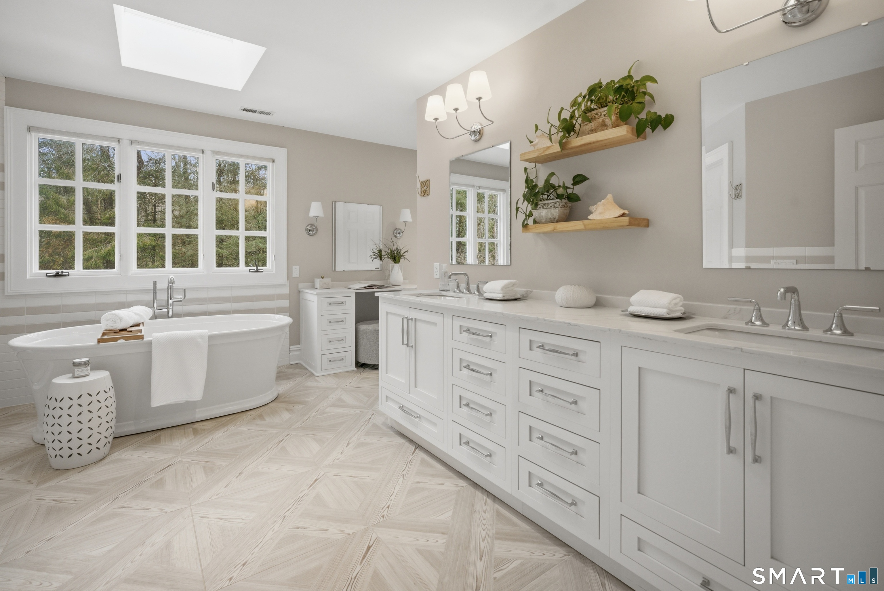 677 Eleven O'Clock Road Fairfield, CT 06824 - Photo 20 of 36 a bathroom with a granite countertop double vanity sink a mirror a bathtub and window