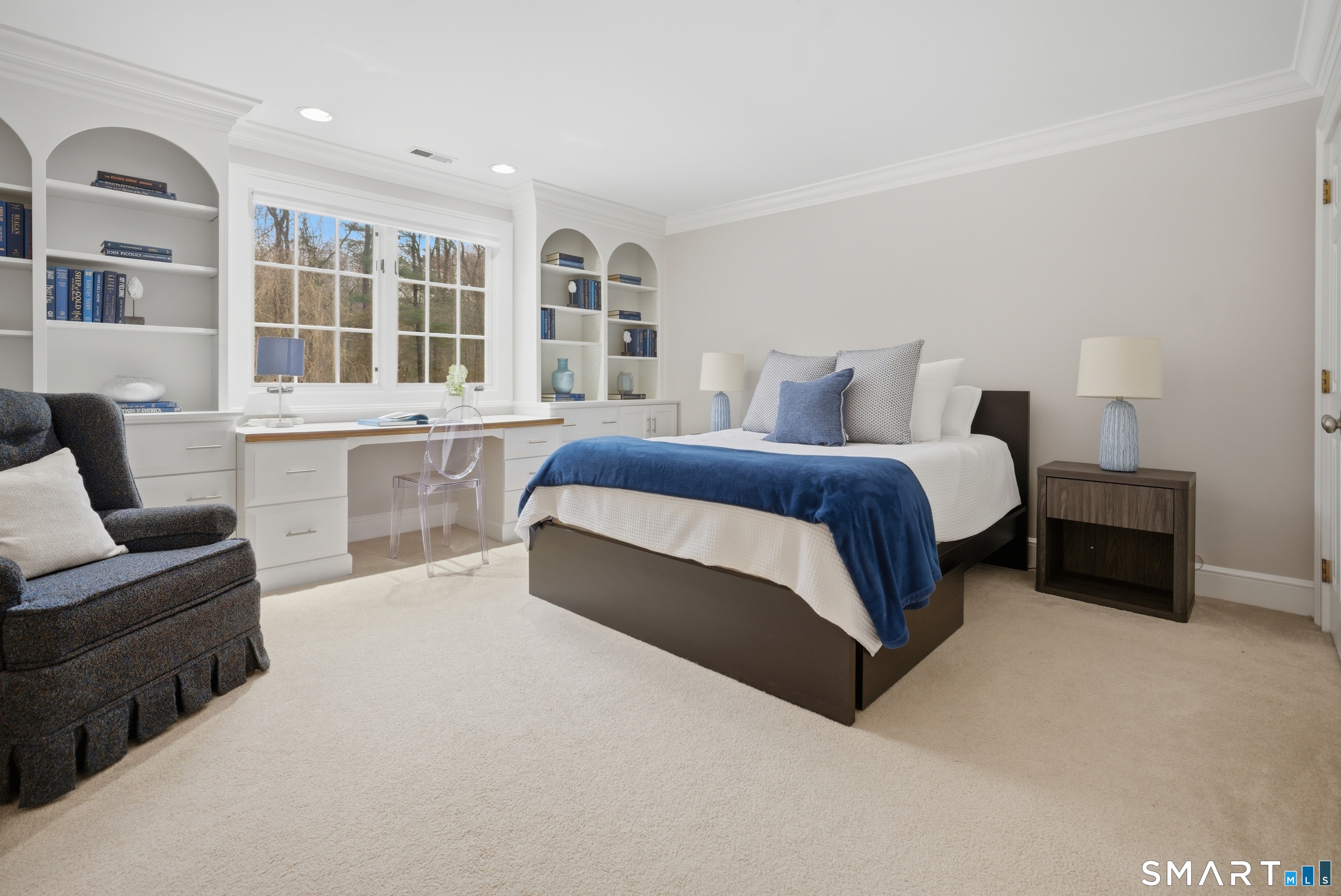 677 Eleven O'Clock Road Fairfield, CT 06824 - Photo 22 of 36 a spacious bedroom with a bed and a couch