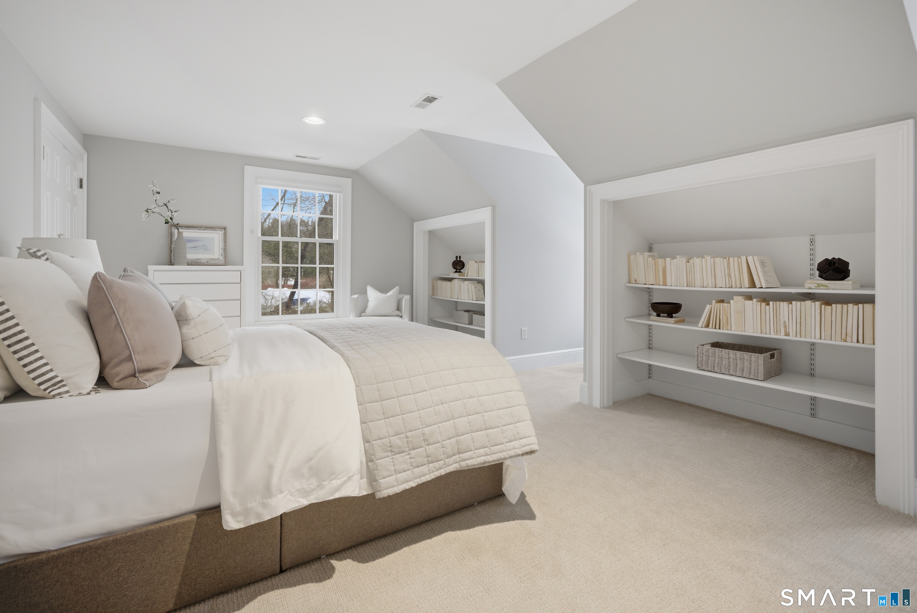 677 Eleven O'Clock Road Fairfield, CT 06824 - Photo 25 of 36 a spacious bedroom with a bed and a large window