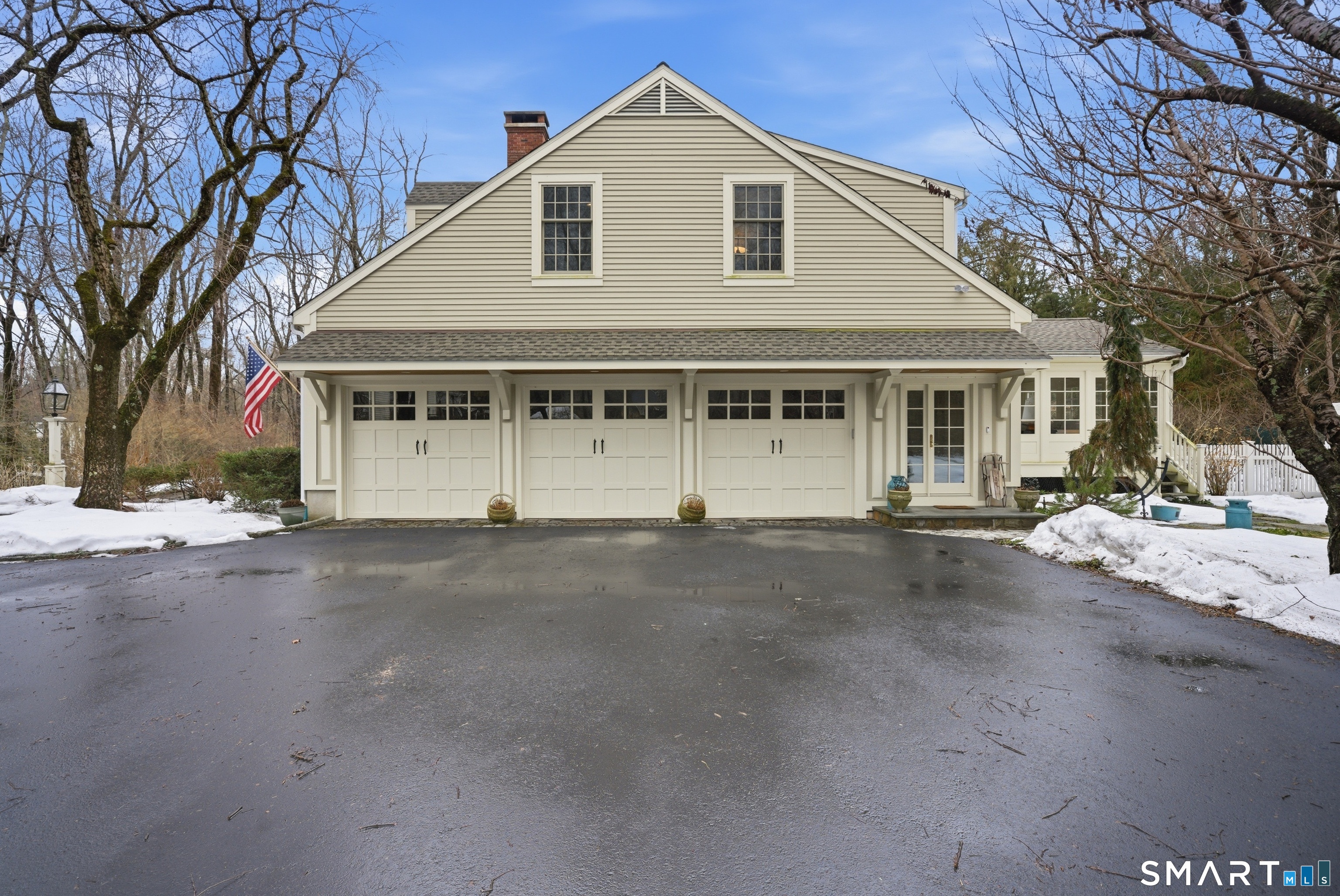 677 Eleven O'Clock Road Fairfield, CT 06824 - Photo 32 of 36 a view of a white house with a large road next to a road