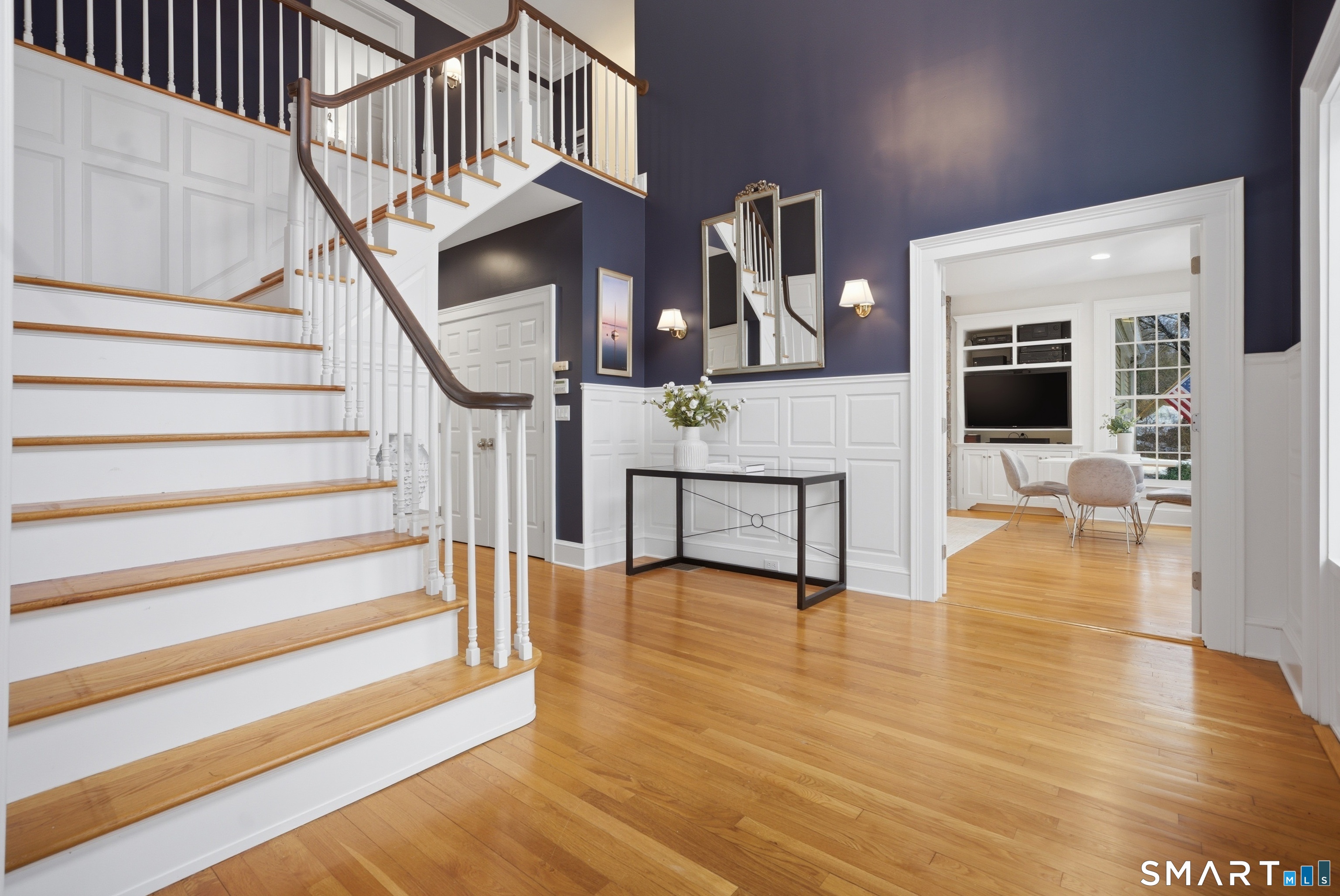 677 Eleven O'Clock Road Fairfield, CT 06824 - Photo 4 of 36 a view of entryway livingroom and hall with wooden floor