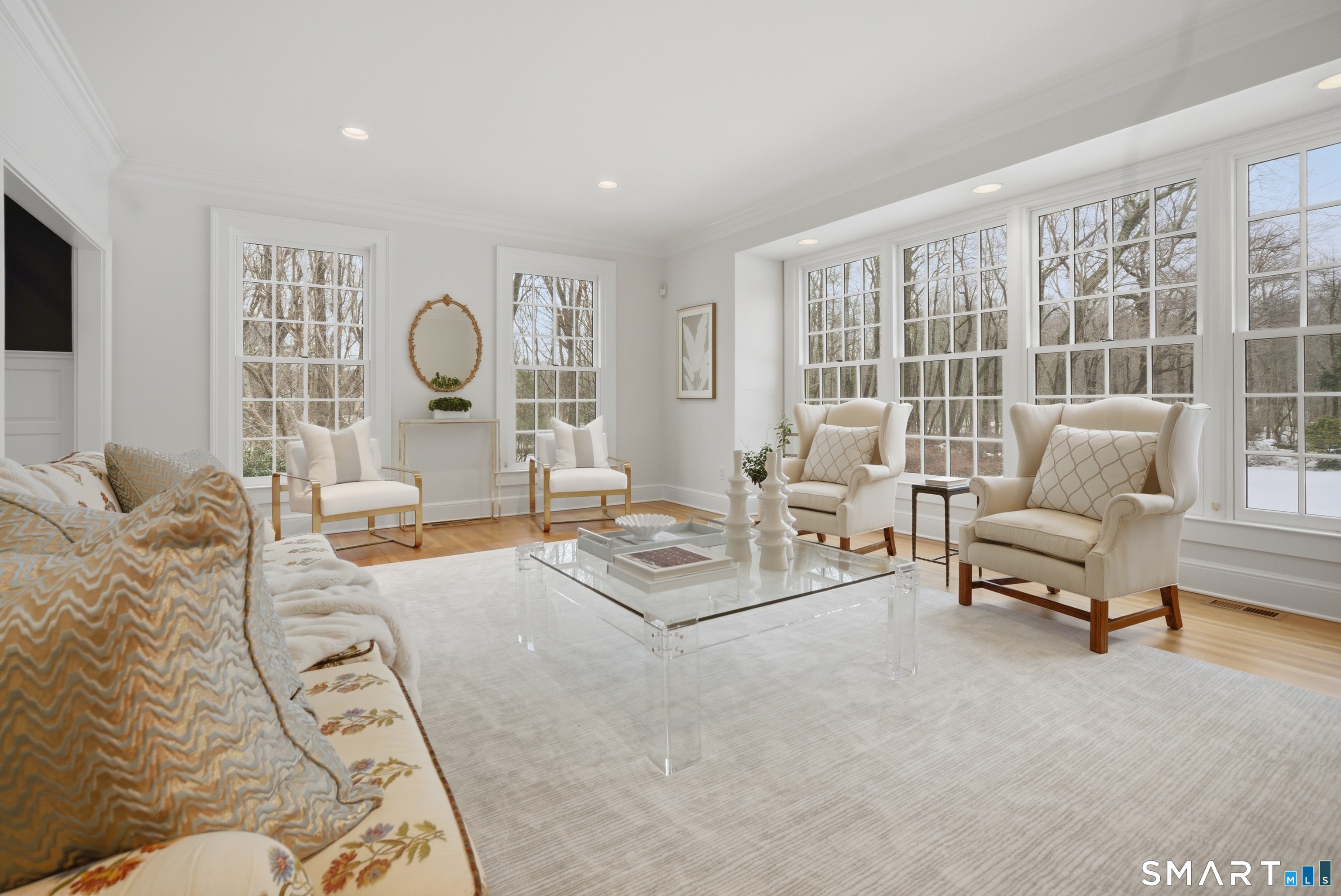 677 Eleven O'Clock Road Fairfield, CT 06824 - Photo 6 of 36 a living room with furniture and a large window