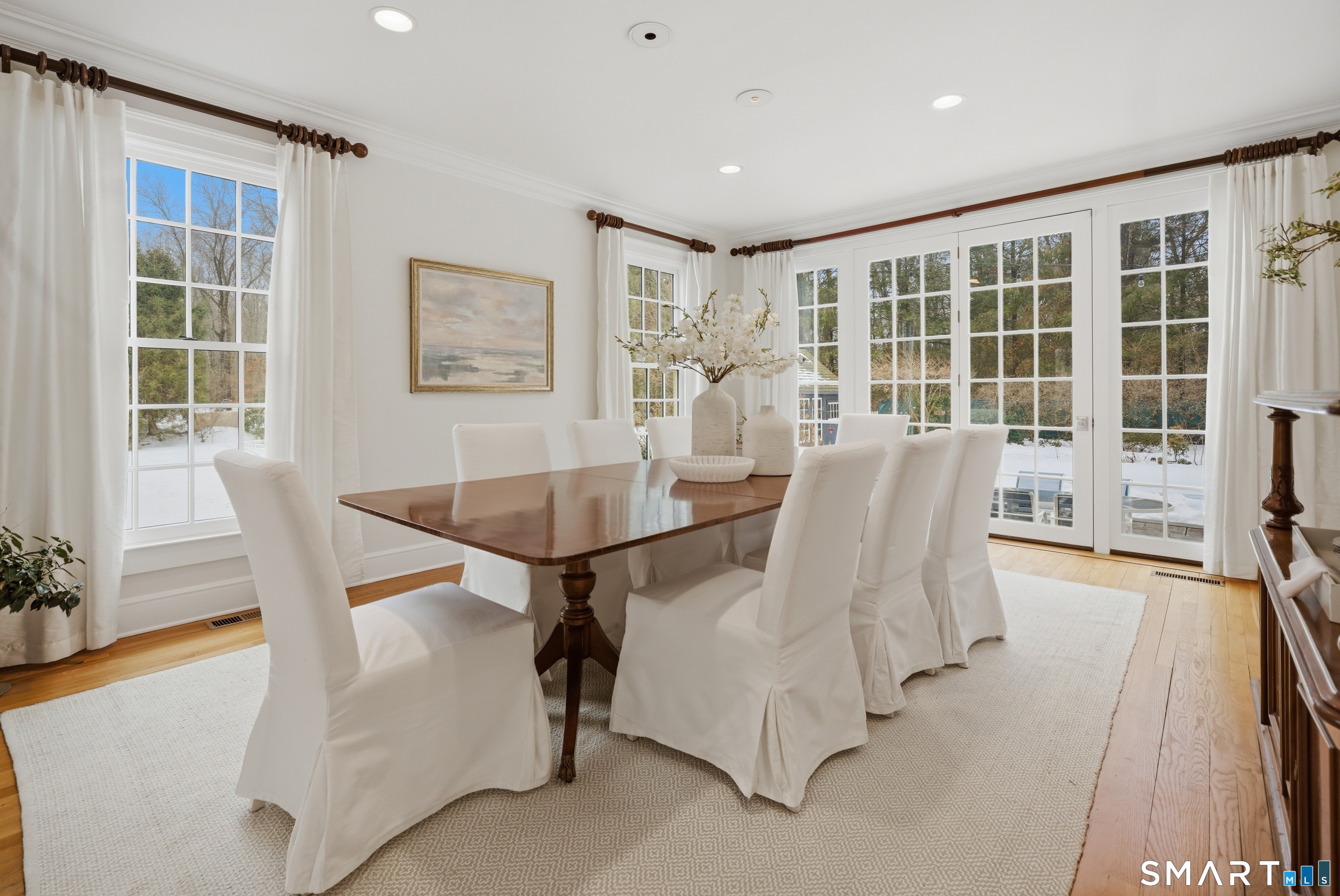 677 Eleven O'Clock Road Fairfield, CT 06824 - Photo 7 of 36 a view of a dining room with furniture window and outside view