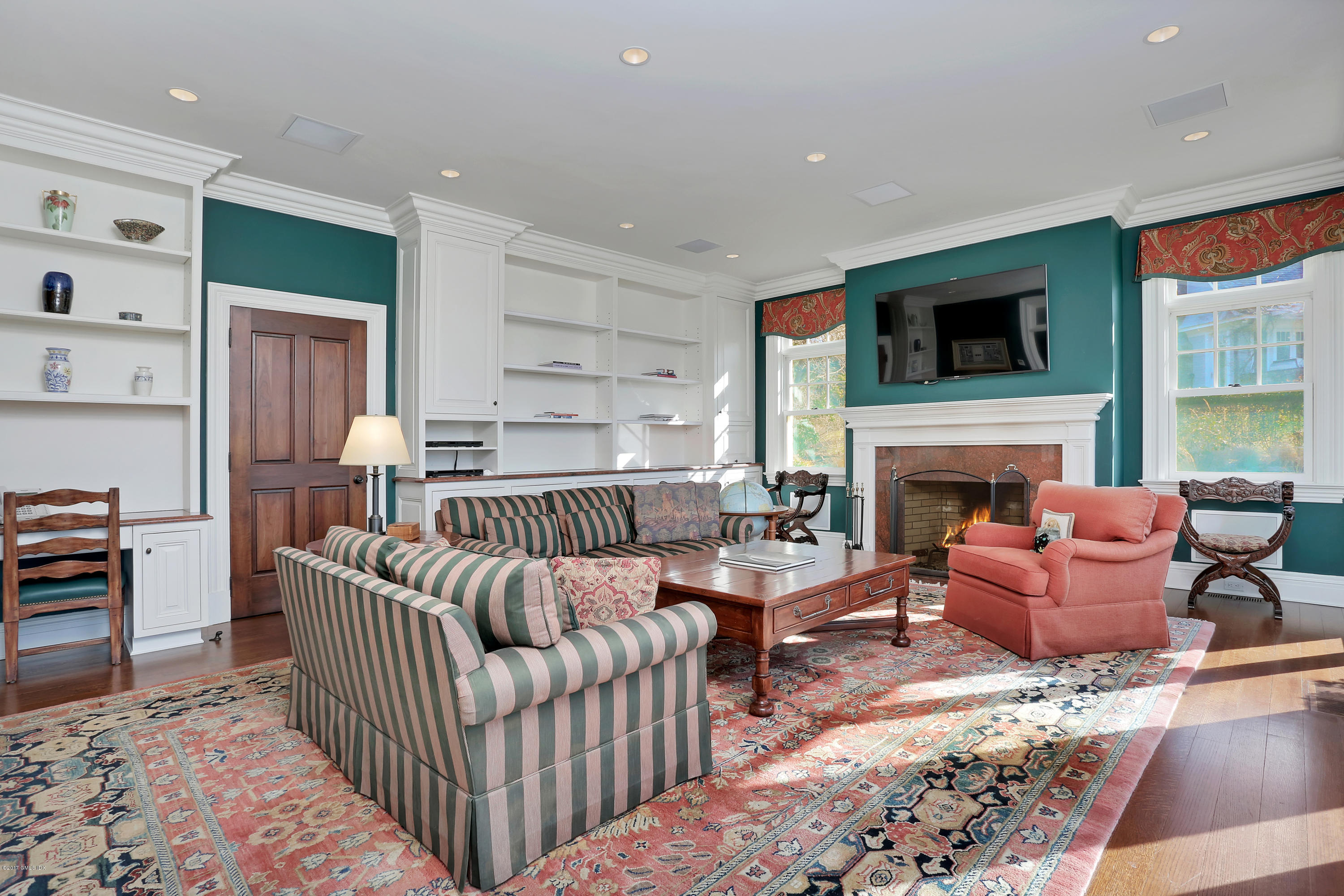41 Leeward Lane Riverside, CT 06878 - Photo 11 of 27 a living room with furniture and a fireplace