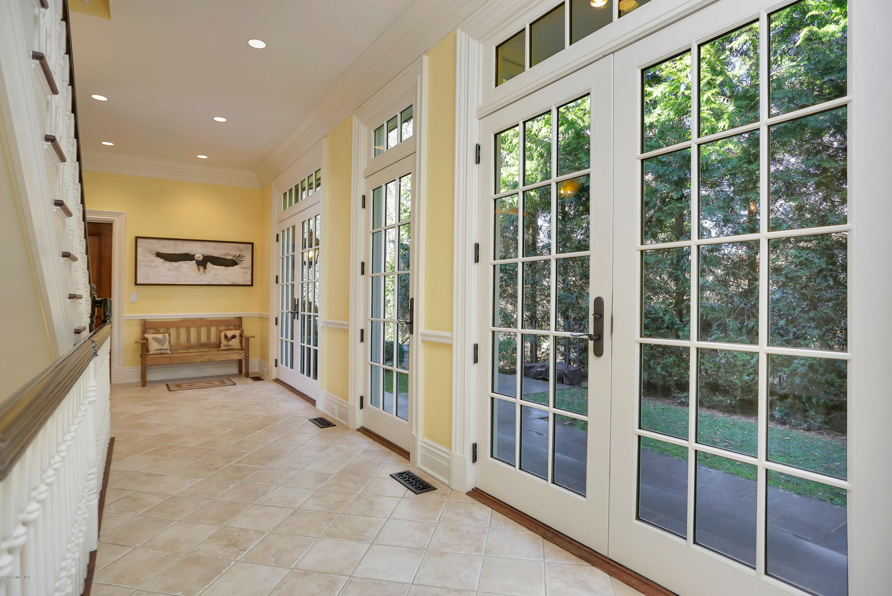 41 Leeward Lane Riverside, CT 06878 - Photo 13 of 27 a view of a hallway with windows