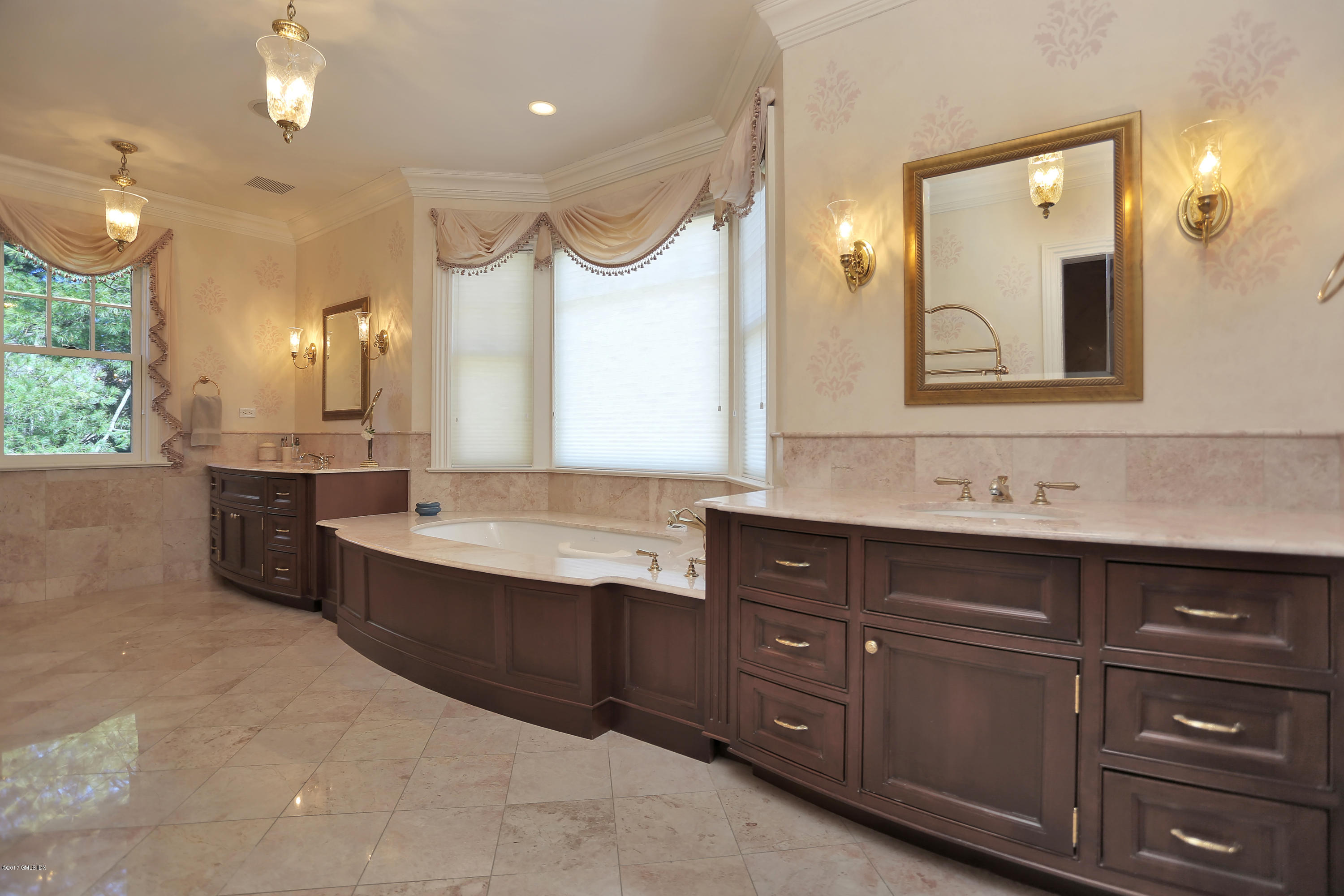 41 Leeward Lane Riverside, CT 06878 - Photo 17 of 27 a bathroom with a sink vanity and a mirror
