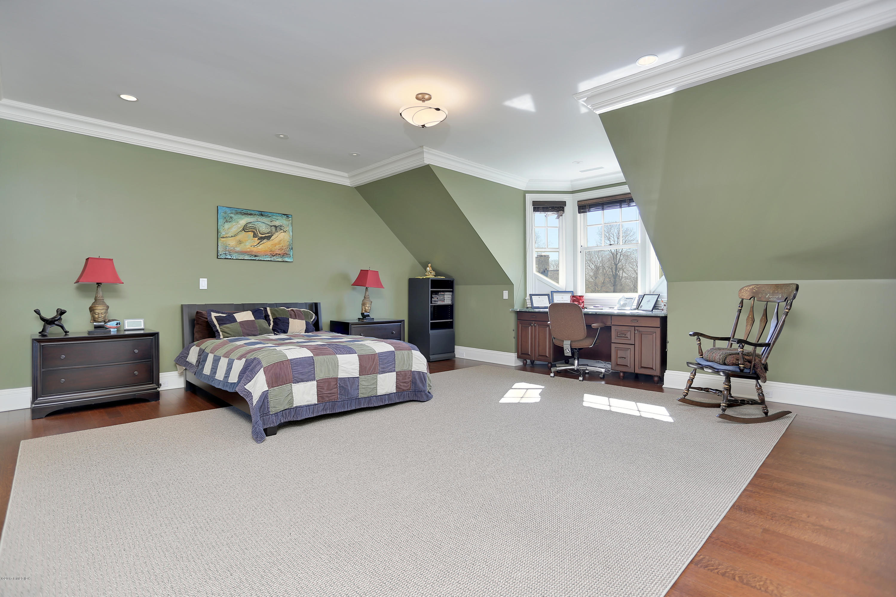 41 Leeward Lane Riverside, CT 06878 - Photo 21 of 27 a bedroom with a bed a table and chair