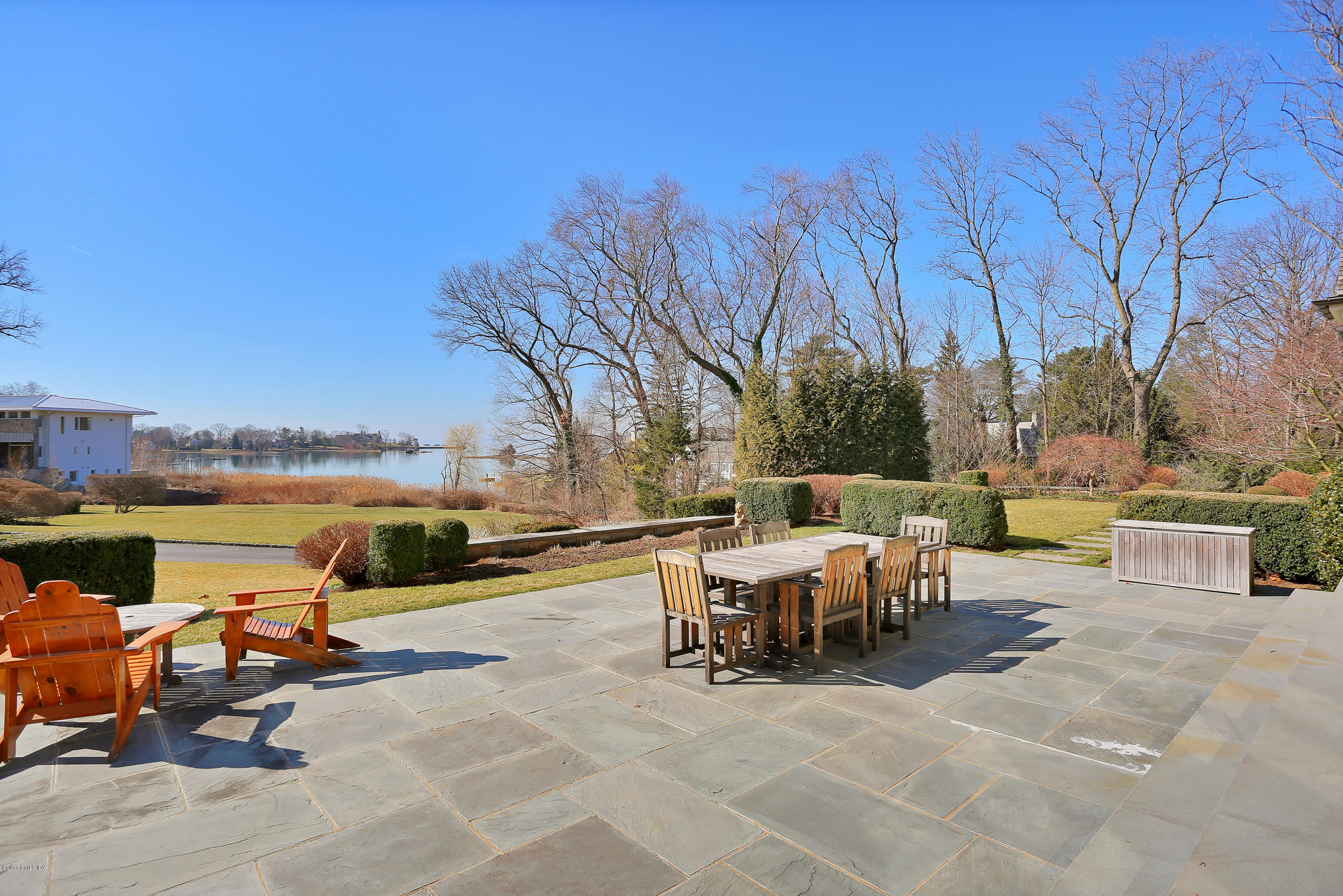 41 Leeward Lane Riverside, CT 06878 - Photo 25 of 27 a view of a patio with swimming pool and sitting area