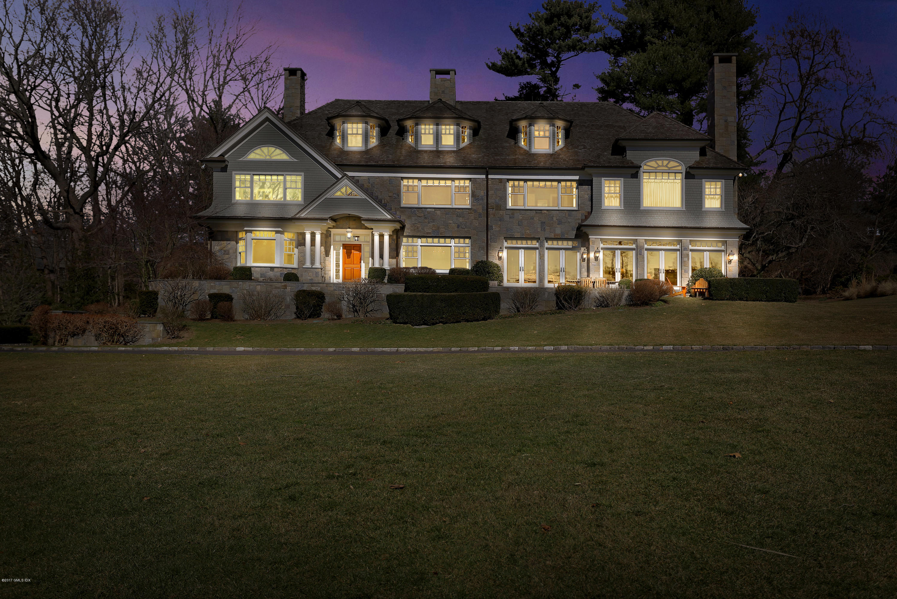 41 Leeward Lane Riverside, CT 06878 - Photo 26 of 27 a front view of a house with a garden