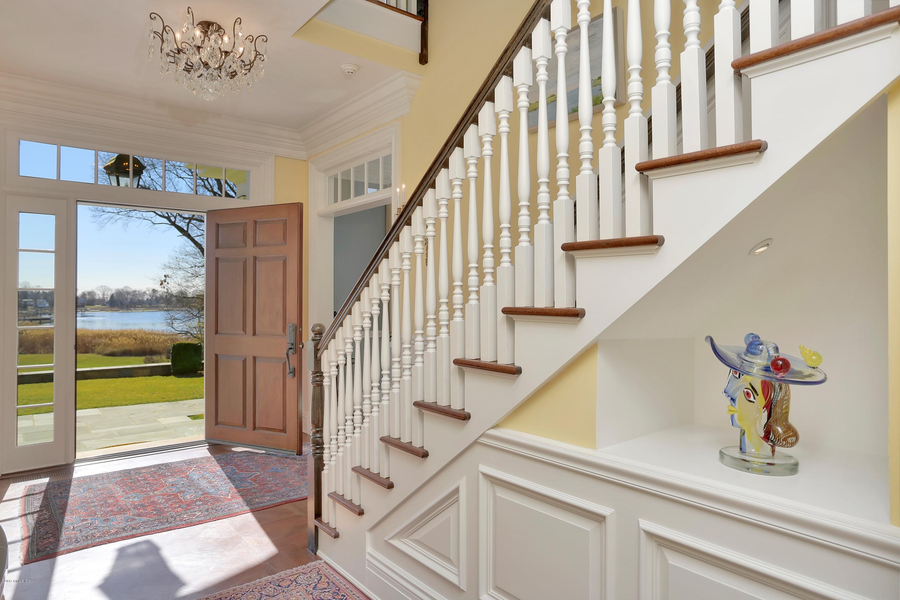 41 Leeward Lane Riverside, CT 06878 - Photo 4 of 27 a view of entryway and hall with wooden floor