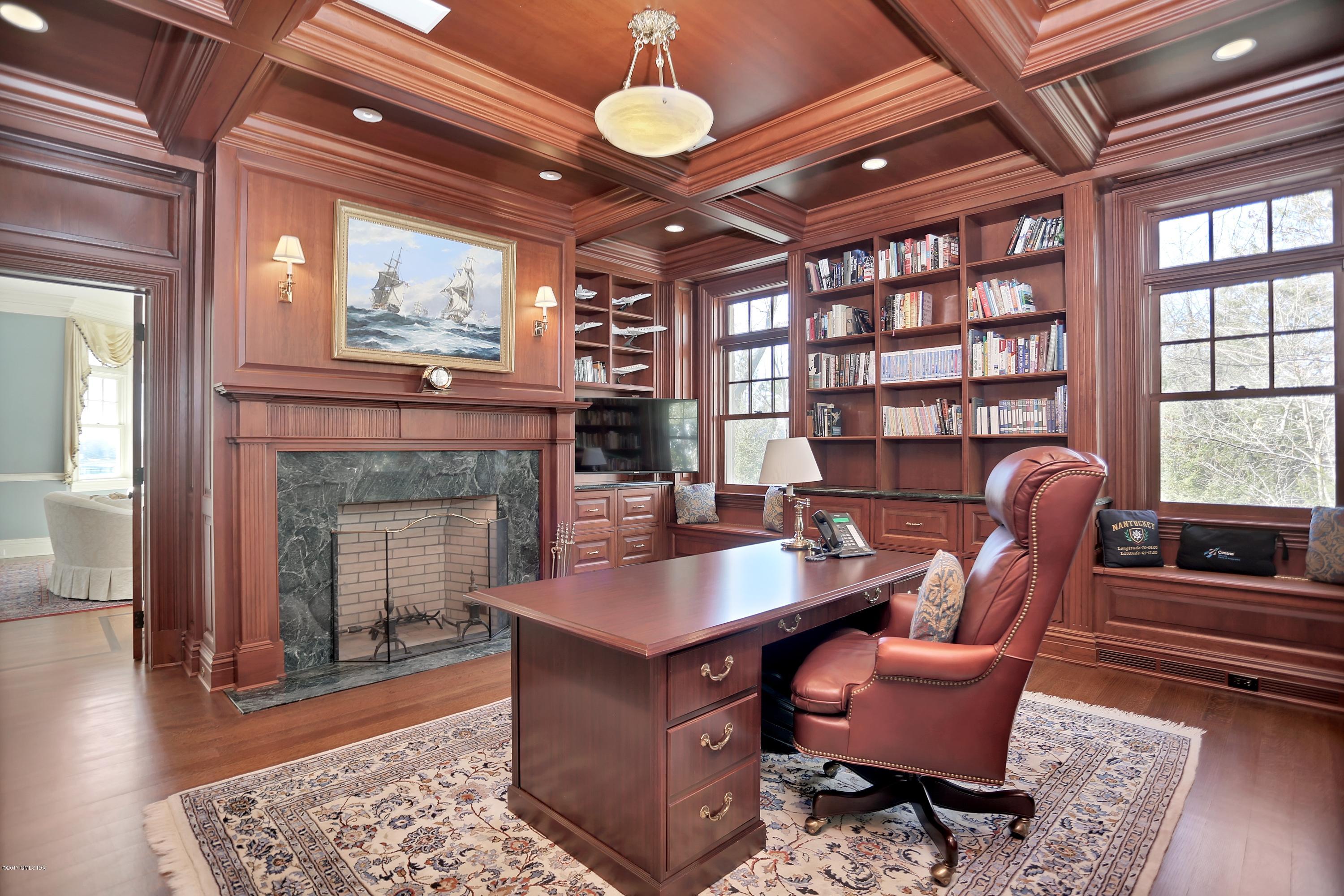 41 Leeward Lane Riverside, CT 06878 - Photo 6 of 27 a living room with furniture a fireplace and wooden floor