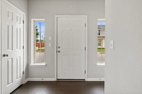 an empty room with windows