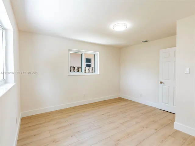 an empty room with a window