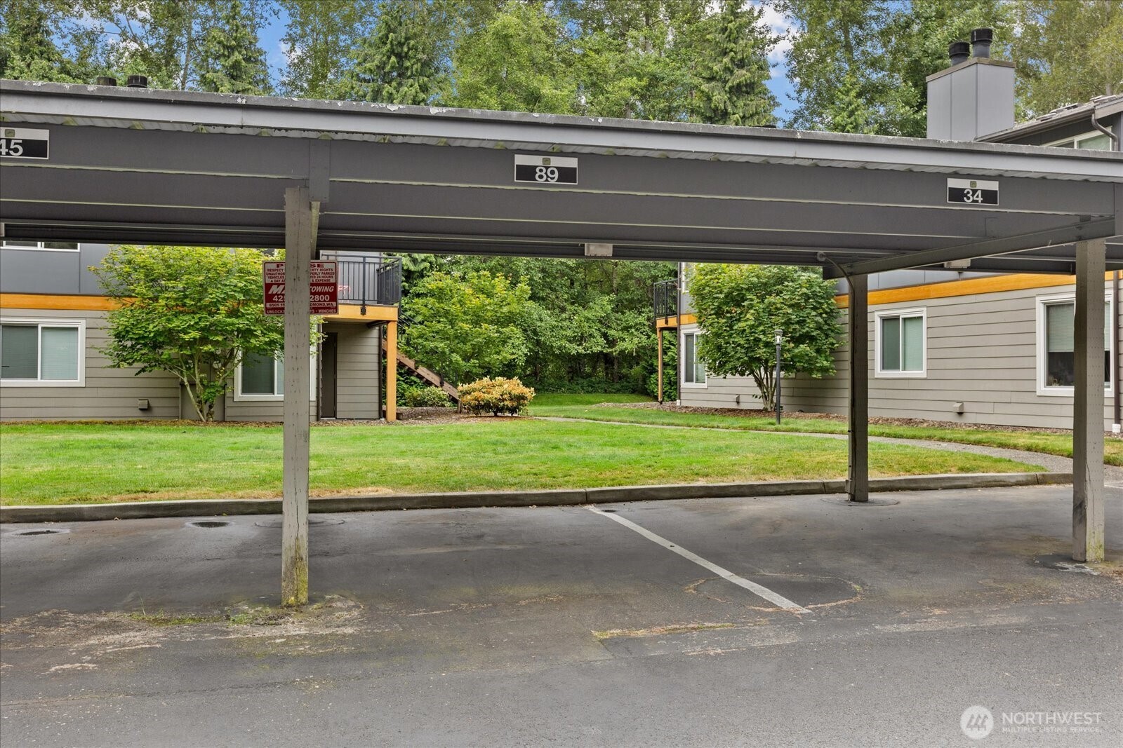 10831 Northeast 147th Lane, Unit R202 Bothell, WA 98011 - Photo 21 of 30 a view of a house with a street