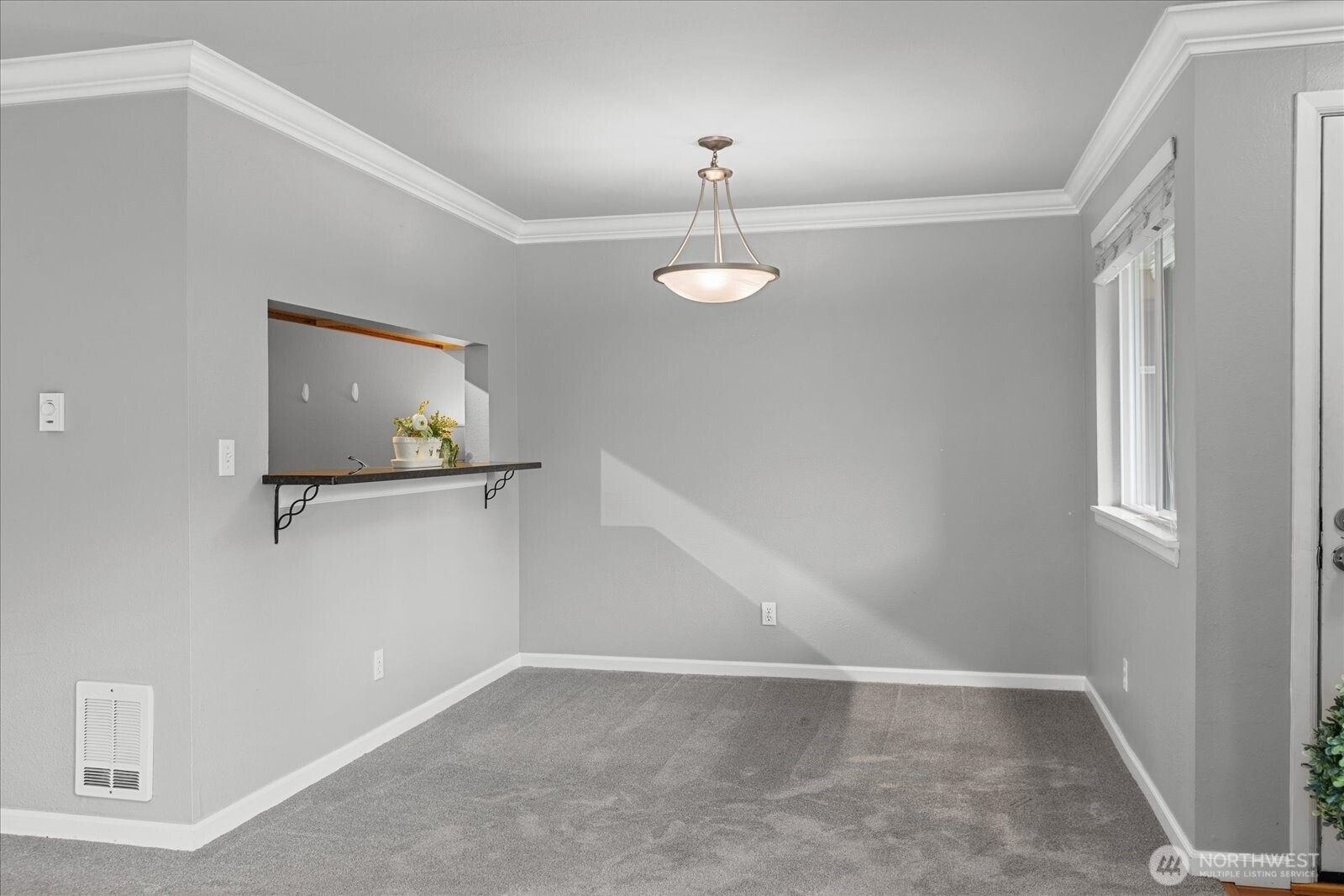 10831 Northeast 147th Lane, Unit R202 Bothell, WA 98011 - Photo 7 of 30 a view of an empty room with a window