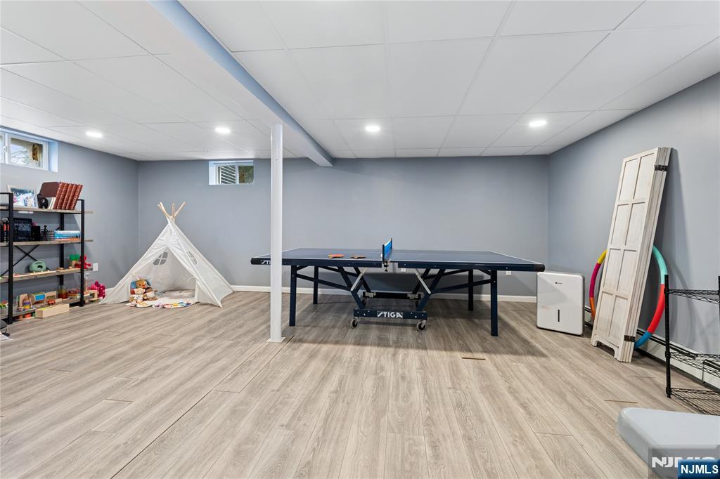 74 Spring Avenue Bergenfield, NJ 07621 - Photo 29 of 39 a view of a room with gym equipment