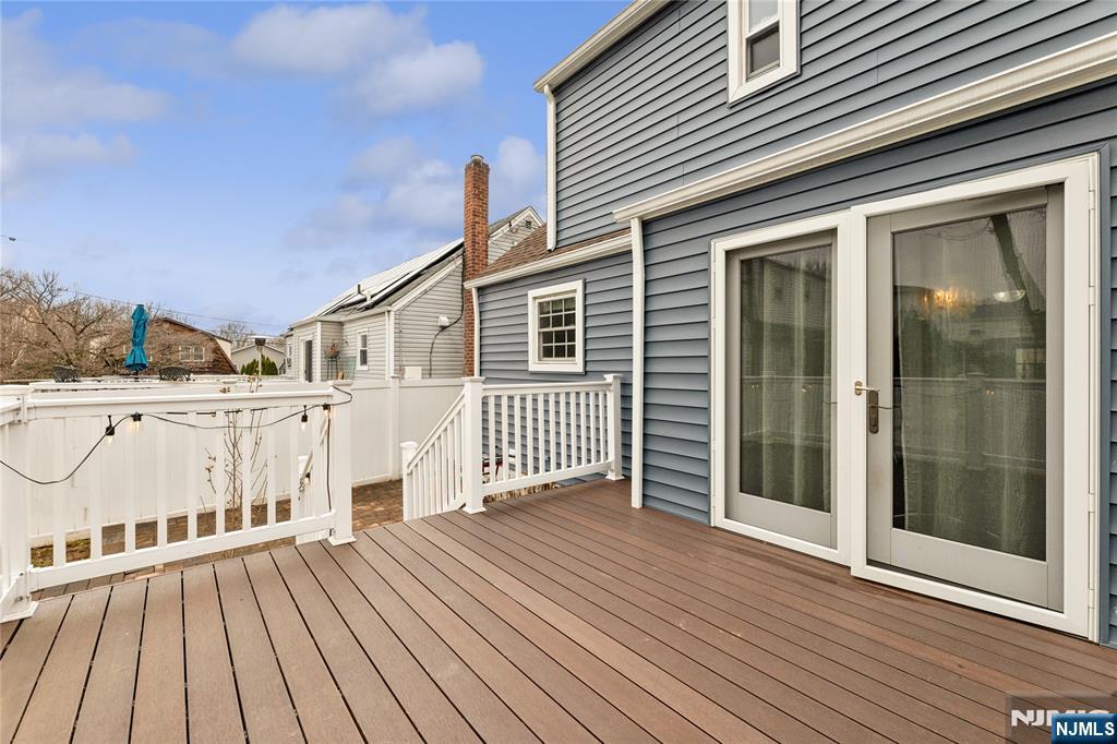 74 Spring Avenue Bergenfield, NJ 07621 - Photo 35 of 39 a view of a house with a deck