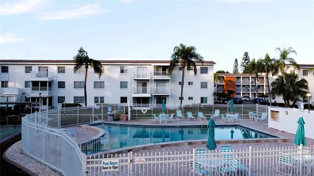 a view of multiple houses with a yard