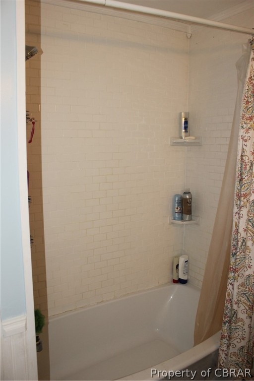 1195 Buckley Hall Road Dutton, VA 23050 - Photo 25 of 47 a bath tub sitting next to a white sink and vanity