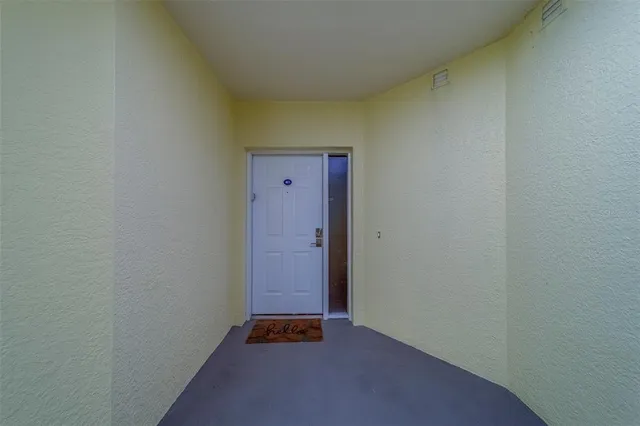 a kitchen with lots of counter top space and stainless steel appliances