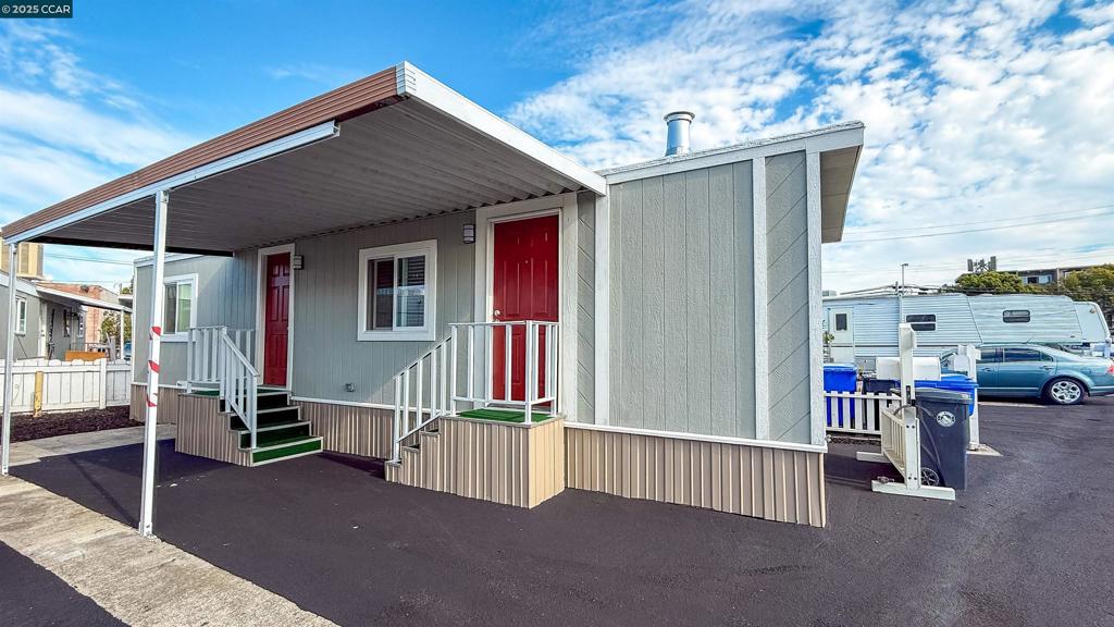 a view of house with outdoor space