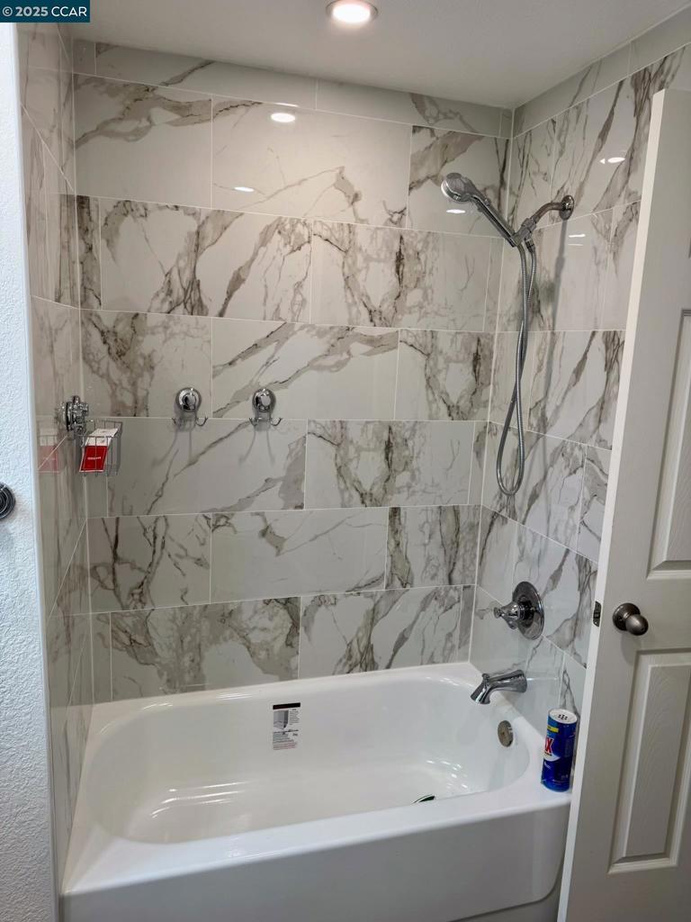 747 Lewelling Boulevard San Leandro, CA 94579 - Photo 13 of 14 a bathroom with a bathtub and shower