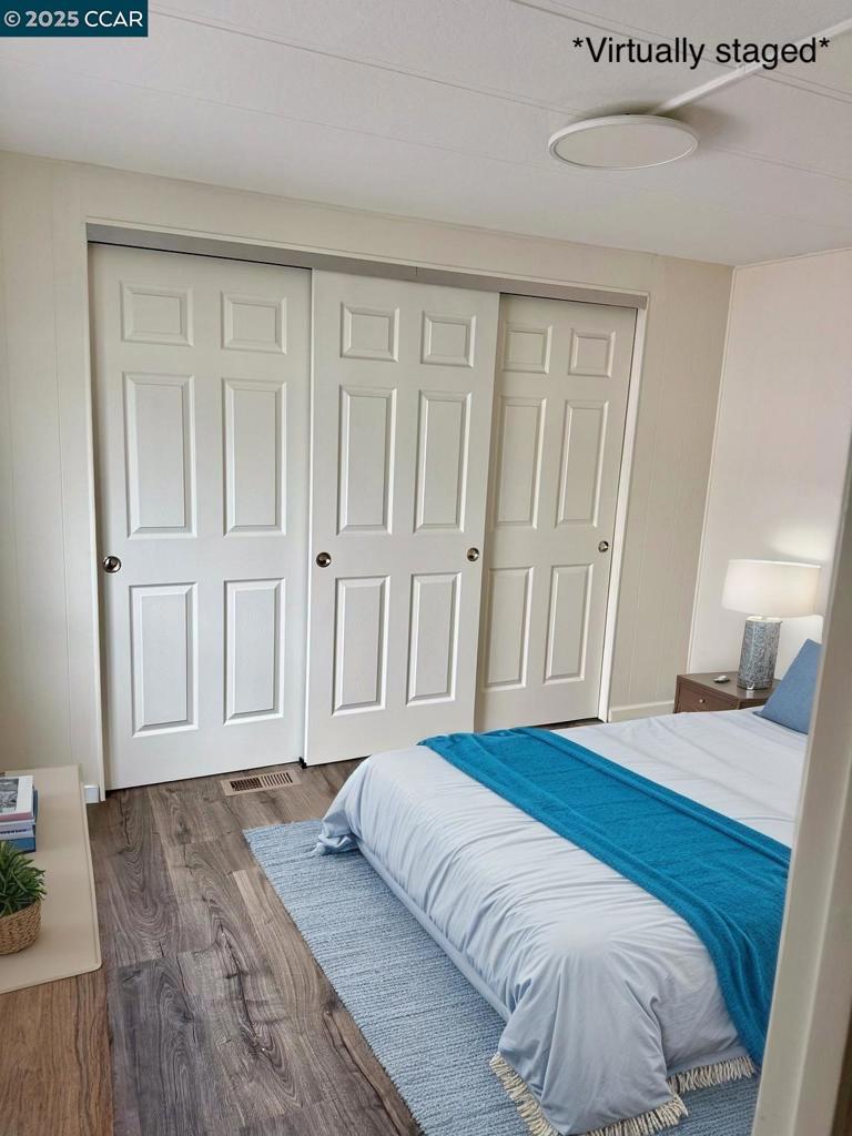 747 Lewelling Boulevard San Leandro, CA 94579 - Photo 6 of 14 a spacious bedroom with a bed