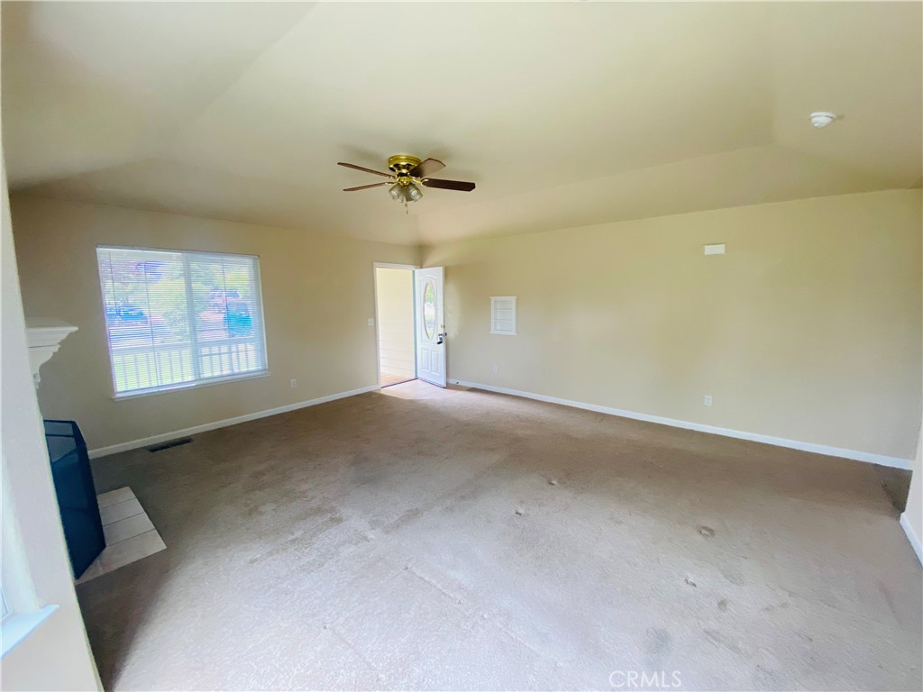 16506 Ridgecrest Court Hidden Valley Lake, CA 95467 - Photo 3 of 25 a view of empty room with a ceiling fan