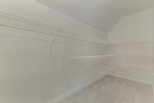 a view of an empty walk in closet
