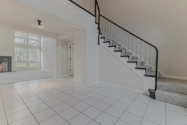 a view of entryway and hall with a window