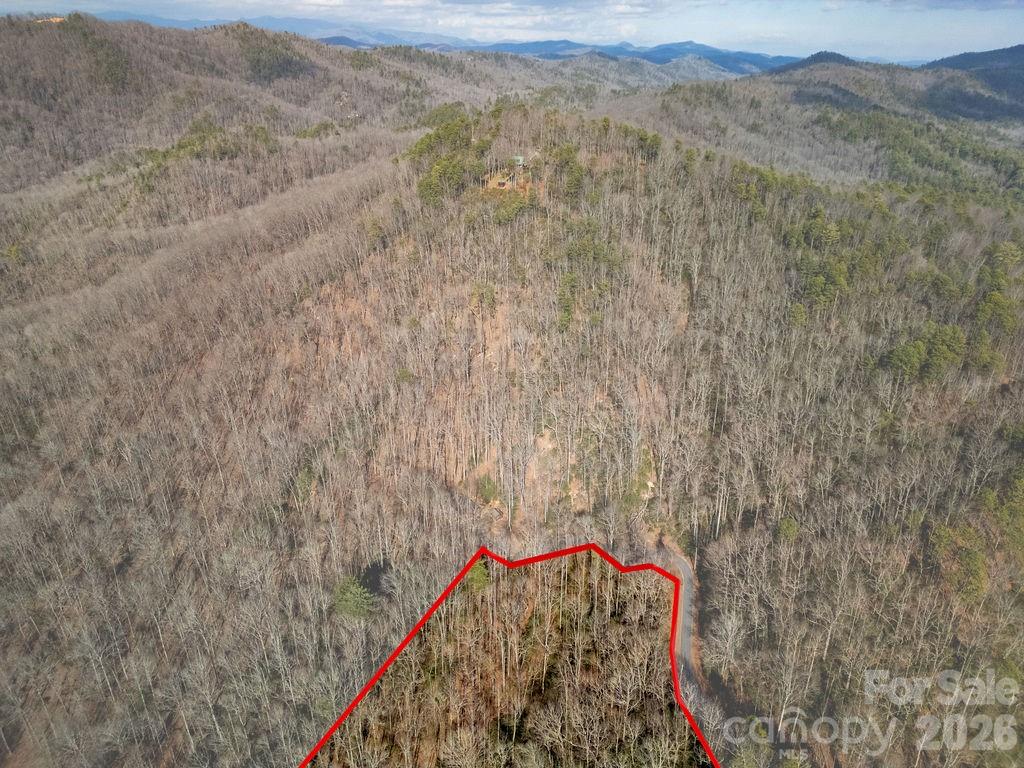 Lot 48 Fox Den Road Brevard, NC 28712 - Photo 12 of 14 a view of a dry yard with mountains and green space
