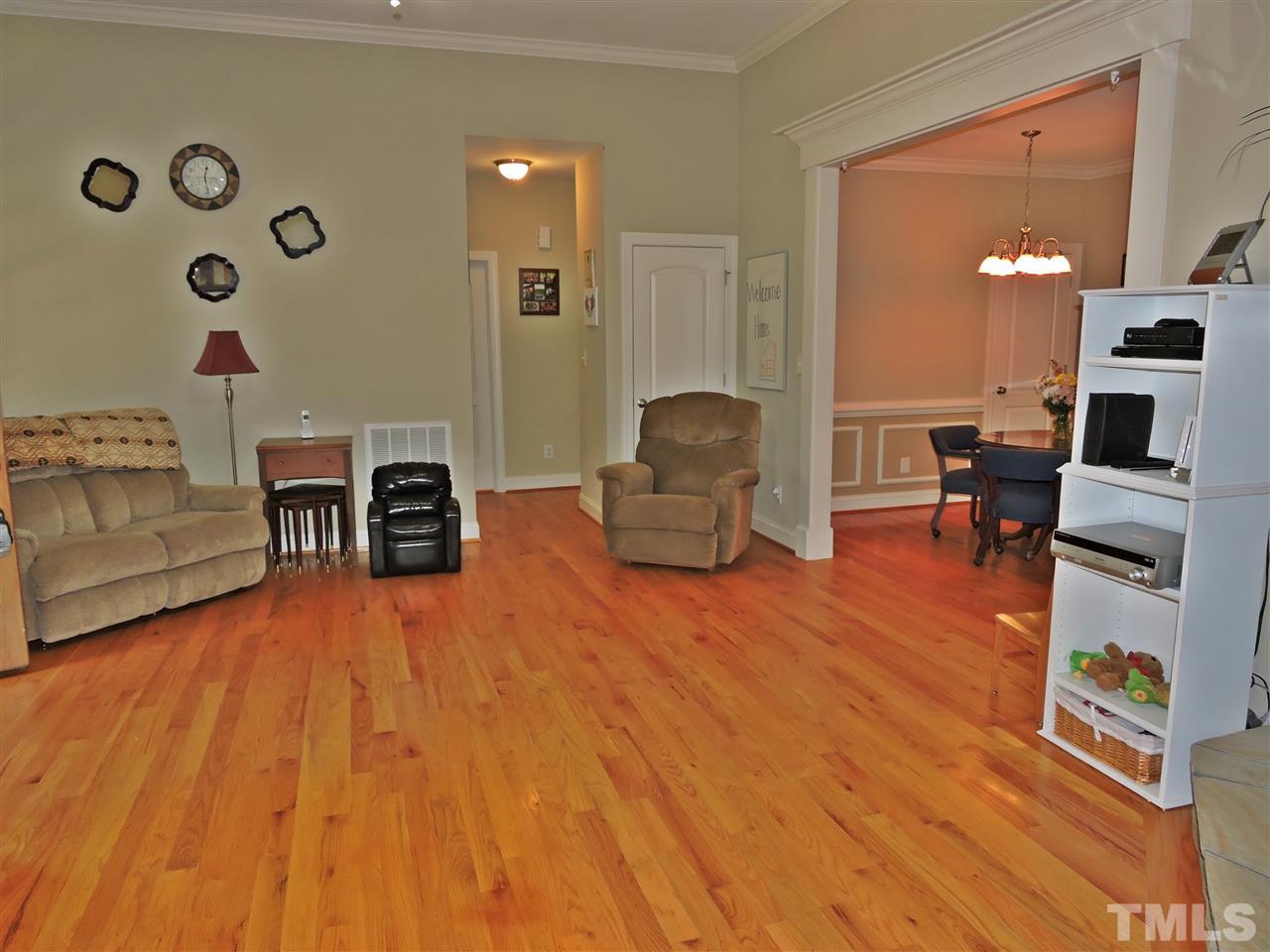 174 Weaver Ridge Road Rougemont, NC 27572 - Photo 14 of 25 a living room with furniture and a fireplace