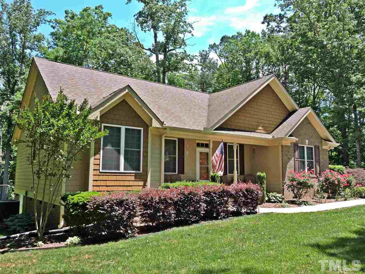 174 Weaver Ridge Road Rougemont, NC 27572 - Photo 25 of 25 a view of a house with a big yard and potted plants