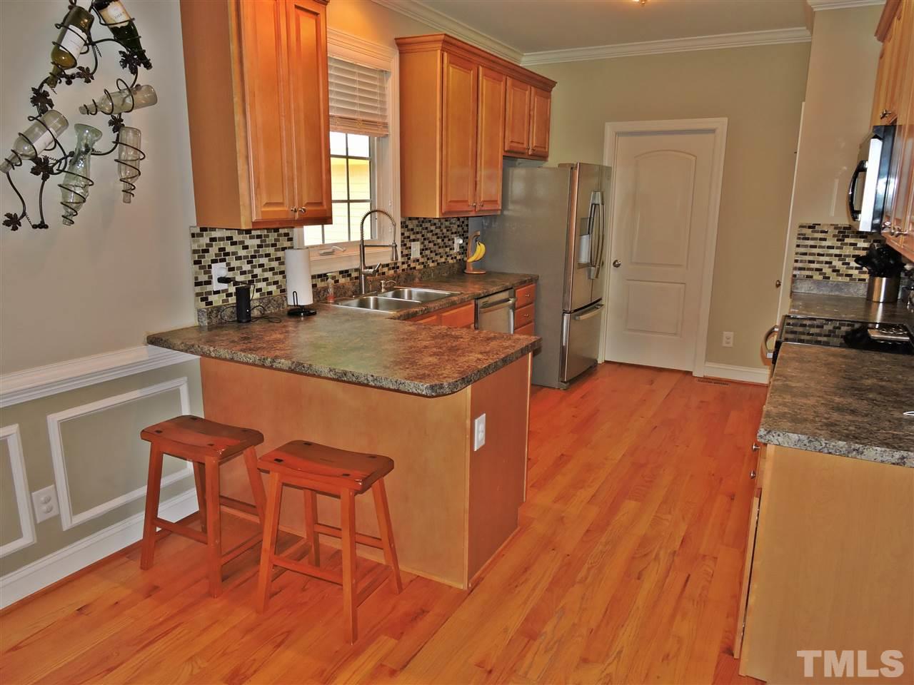174 Weaver Ridge Road Rougemont, NC 27572 - Photo 5 of 25 a dining room with furniture and wooden floor