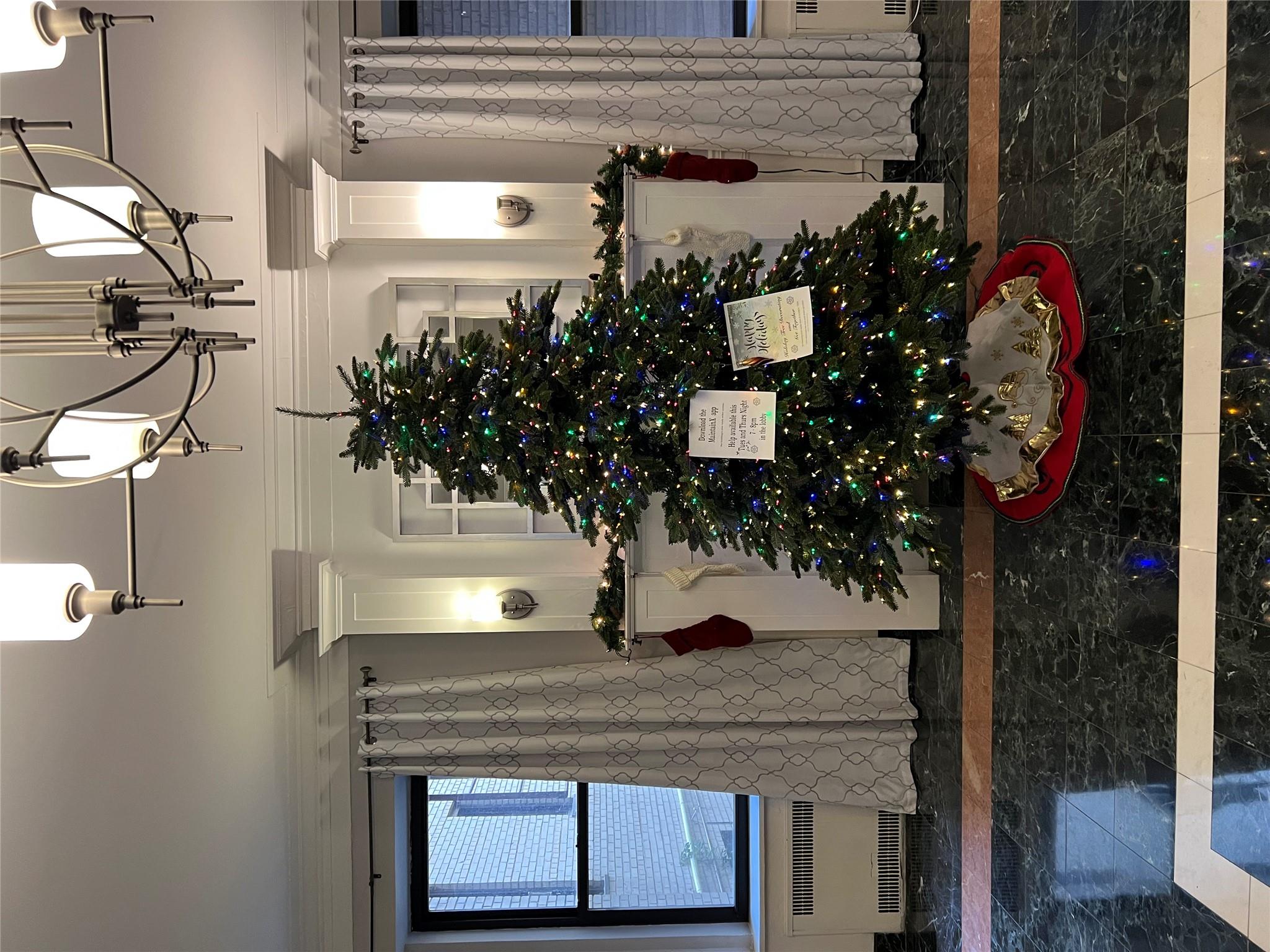 35-35 75th Street, Unit 127 Queens, NY 11372 - Photo 11 of 50 Interior details with radiator, a chandelier, and ornamental molding