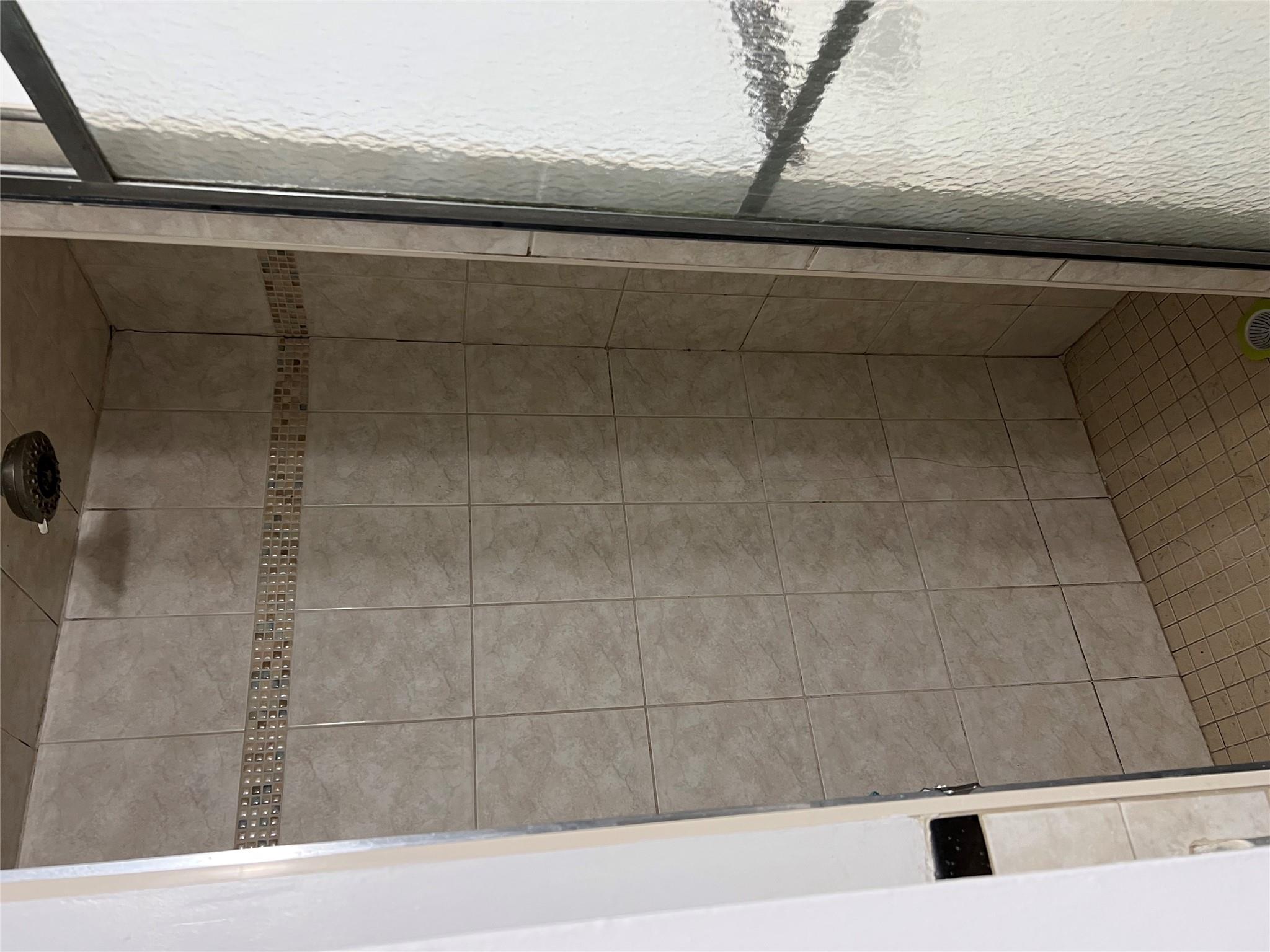 35-35 75th Street, Unit 127 Queens, NY 11372 - Photo 24 of 50 Bathroom featuring a shower with shower door